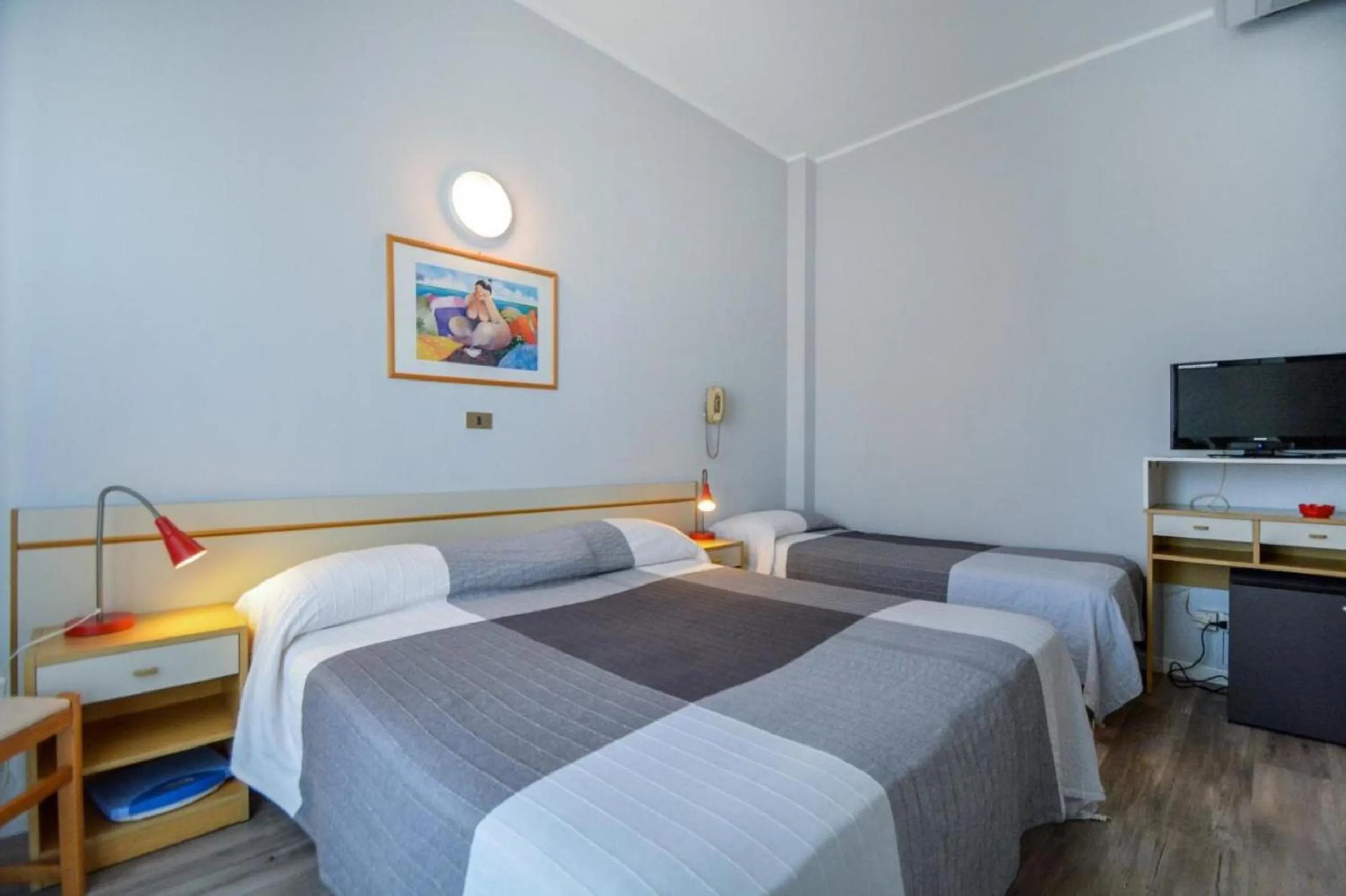 Bed in Hotel Mirabella