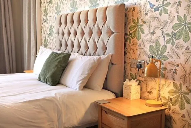 Bed in The Marine Hotel