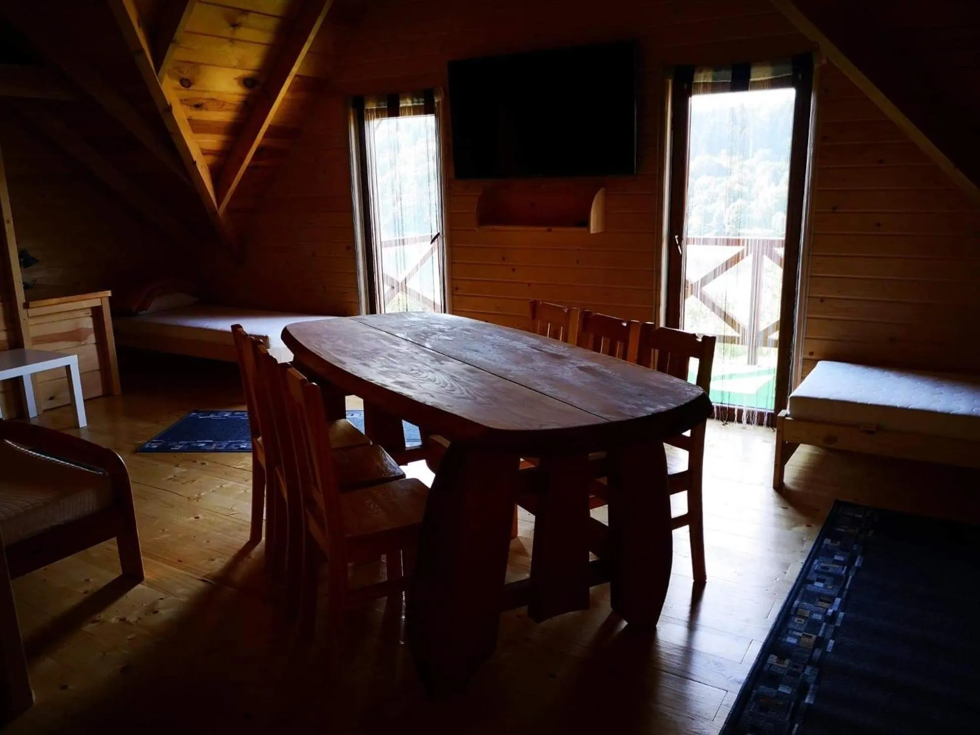 Communal lounge/ TV room, Bed in Wataha Zawóz