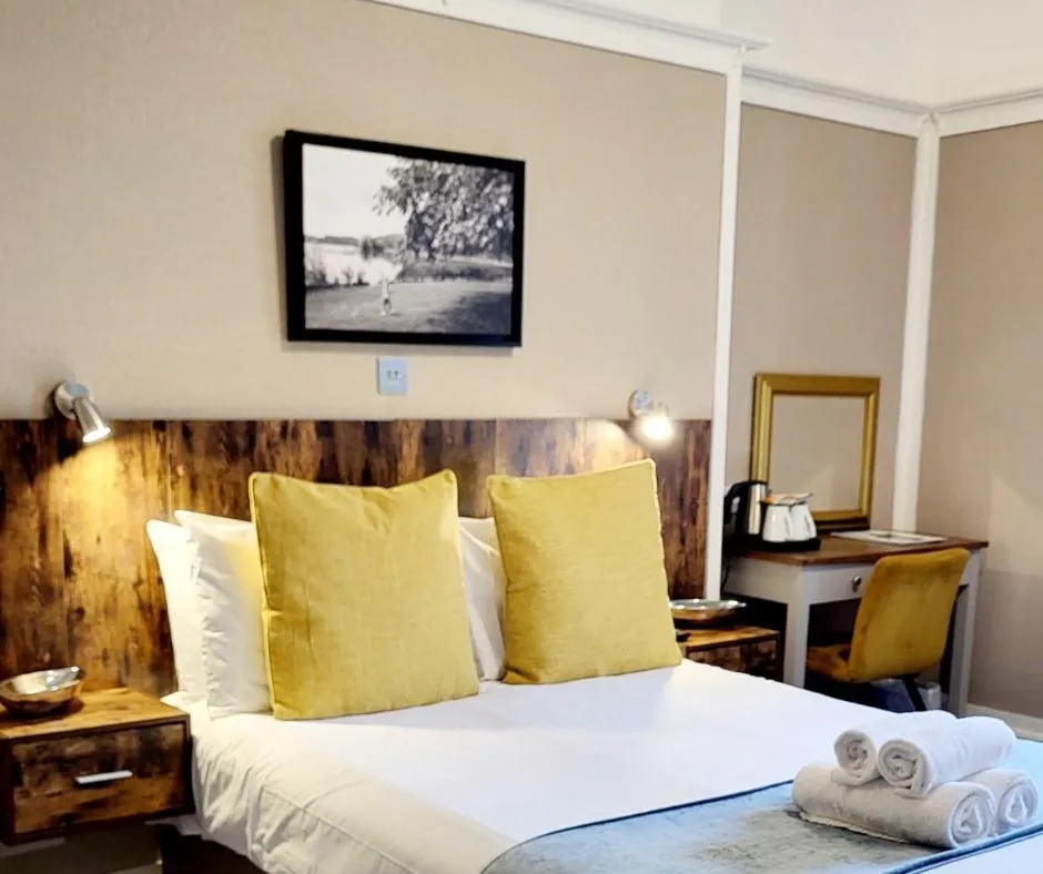 Bed in The Market Inn Hotel