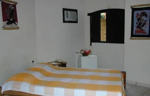 Photo of the whole room, Bed in Pousada O Cantinho