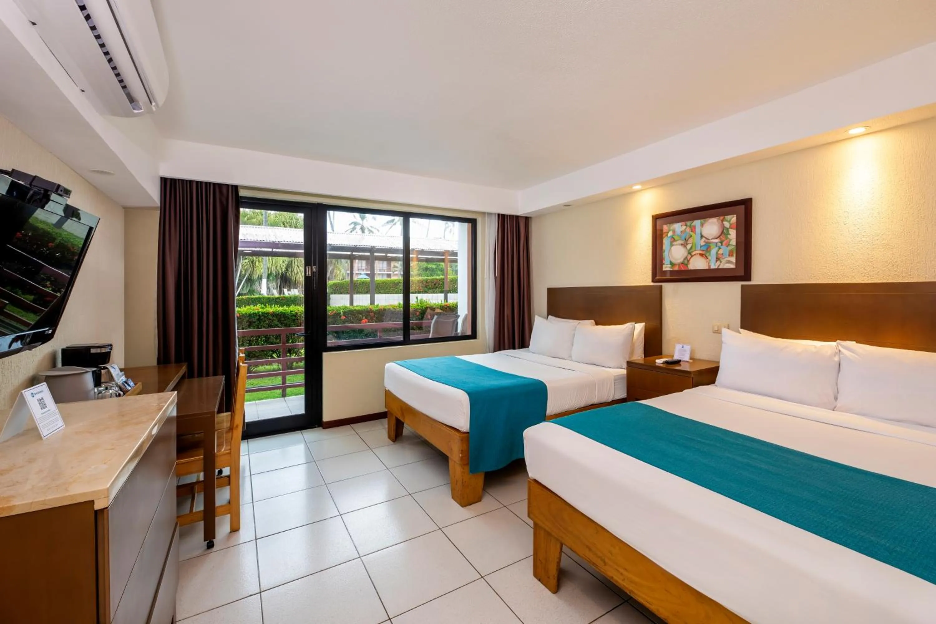 Bed in Best Western Jaco Beach All Inclusive Resort