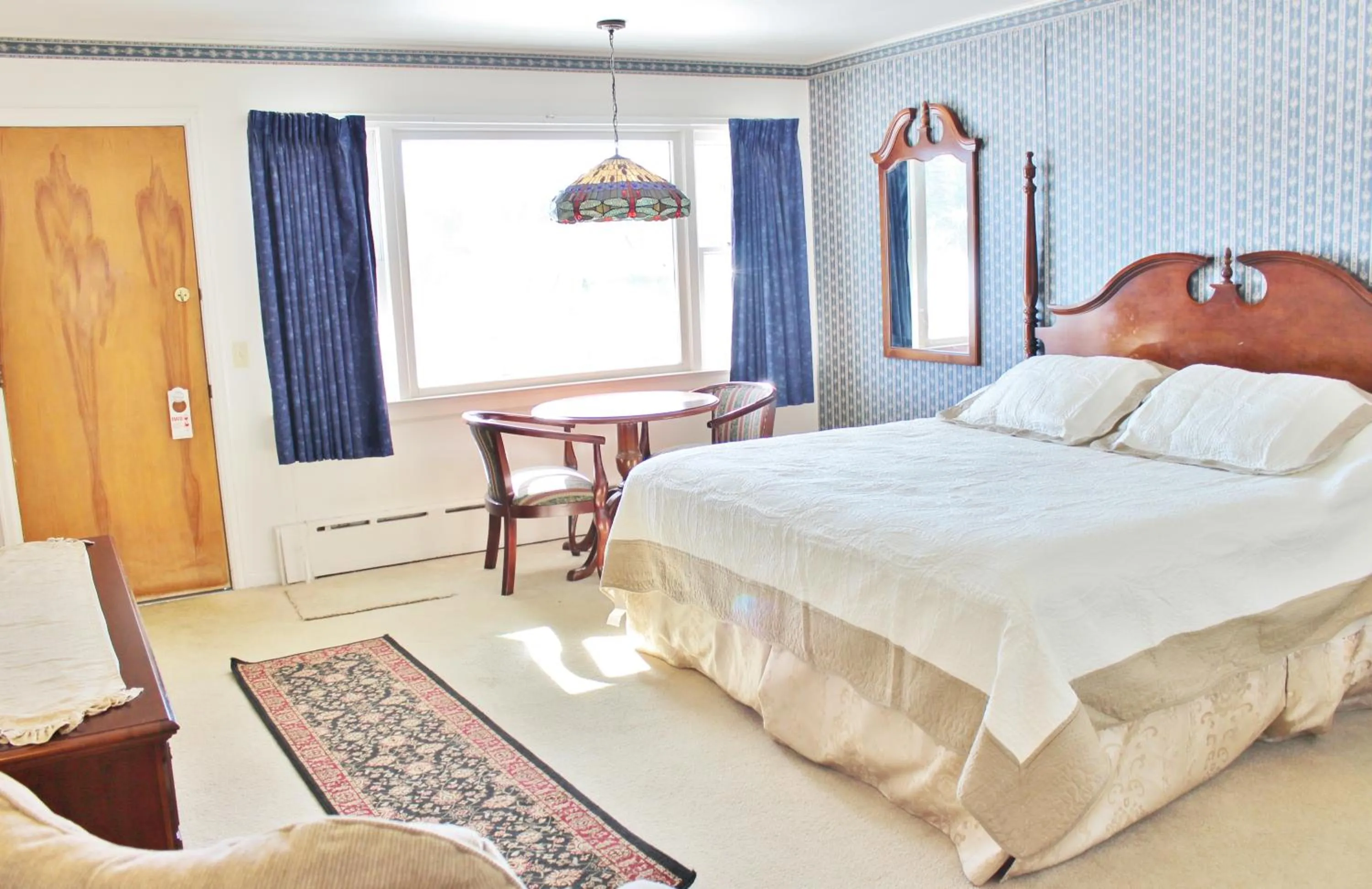 Bedroom, Bed in Sara Placid Inn & Suites