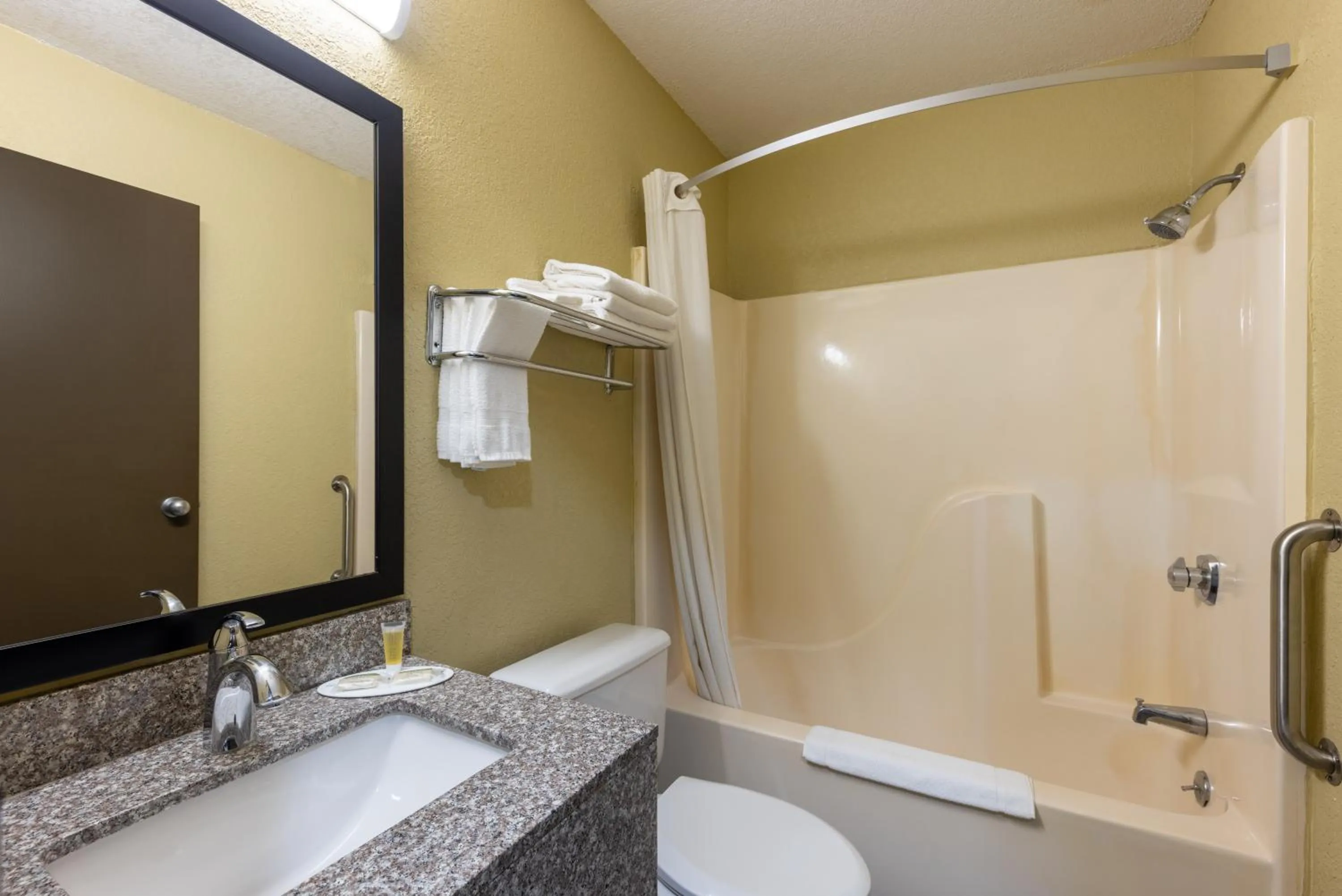 Bathroom in Super 8 by Wyndham Nixa/Springfield Area