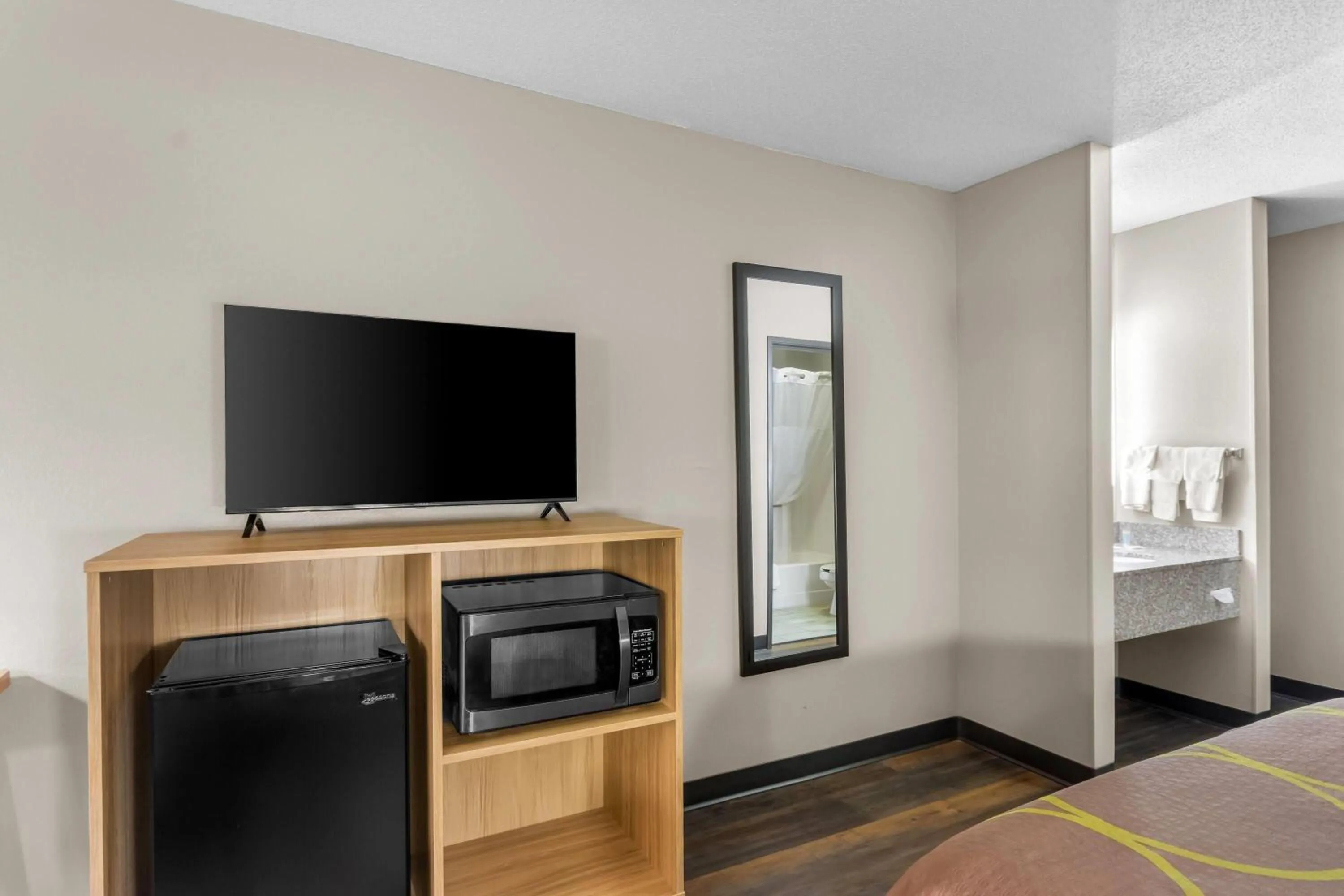 Bed in Super 8 by Wyndham Evansville East