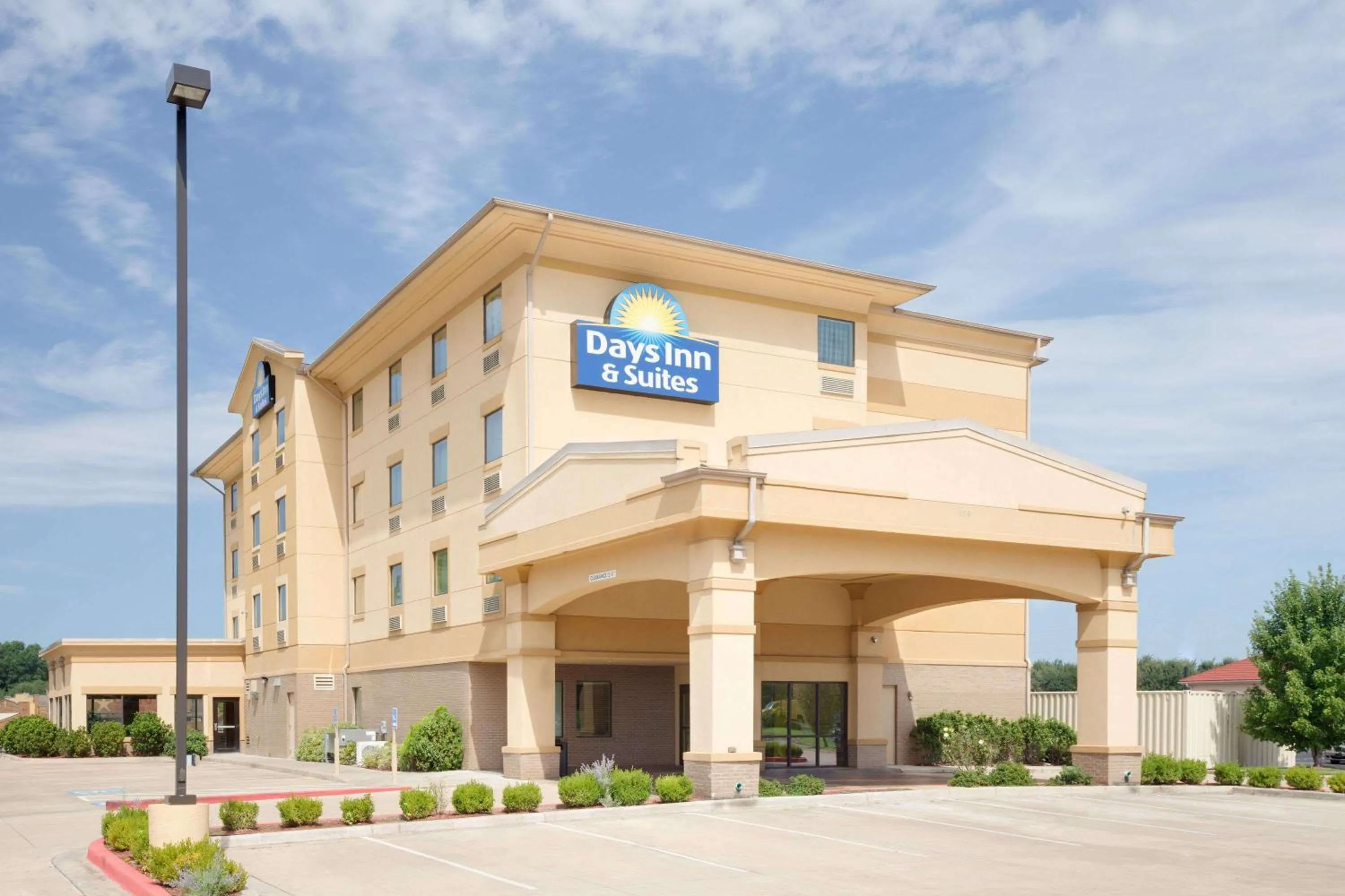 Property building in Days Inn & Suites by Wyndham Russellville