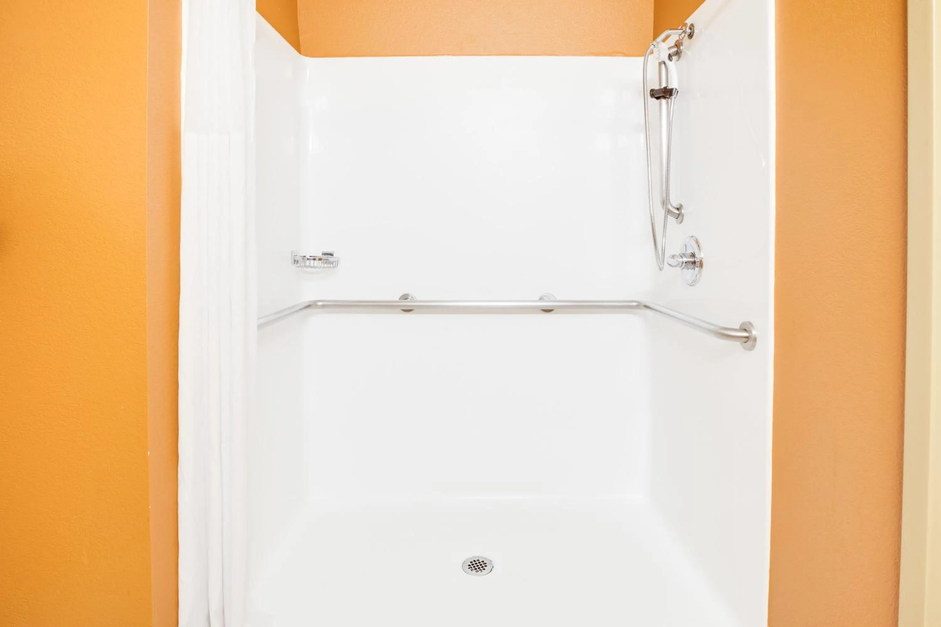 Bathroom in Days Inn & Suites by Wyndham Russellville