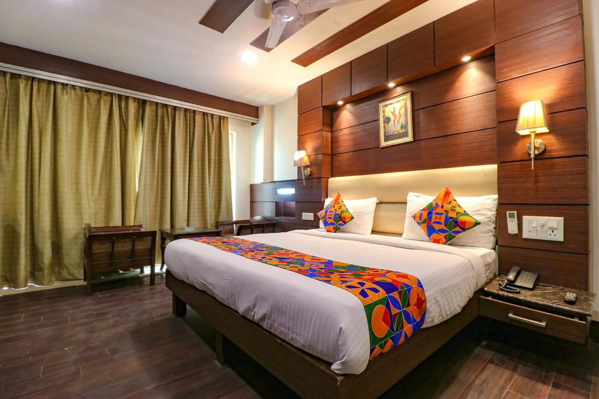 Bed in FabHotel Admire Suites