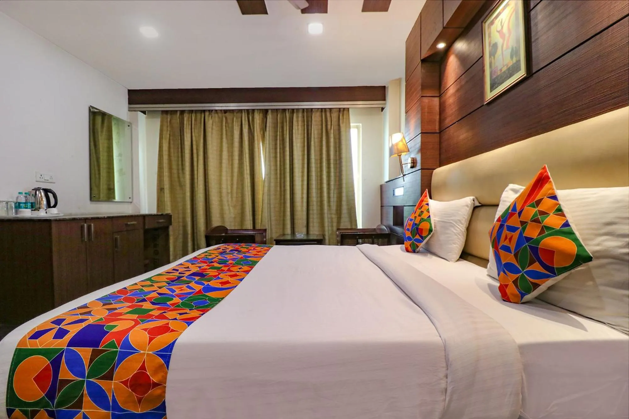 Bed in FabHotel Admire Suites