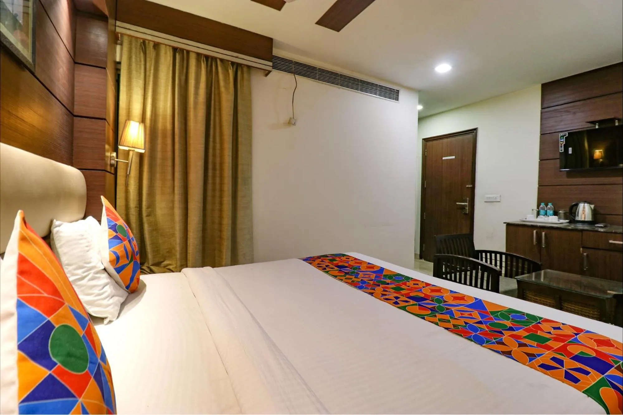 Bed in FabHotel Admire Suites