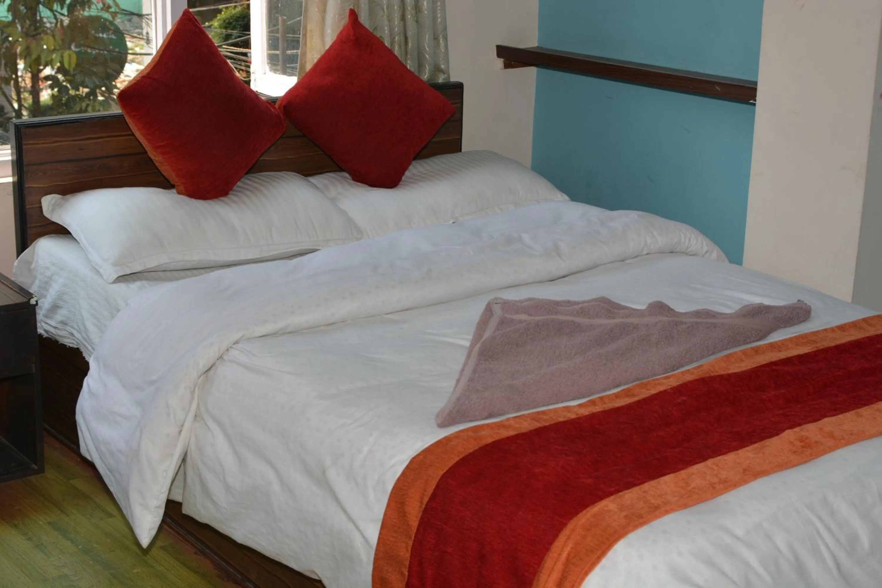 Bed in Hotel Discovery Inn