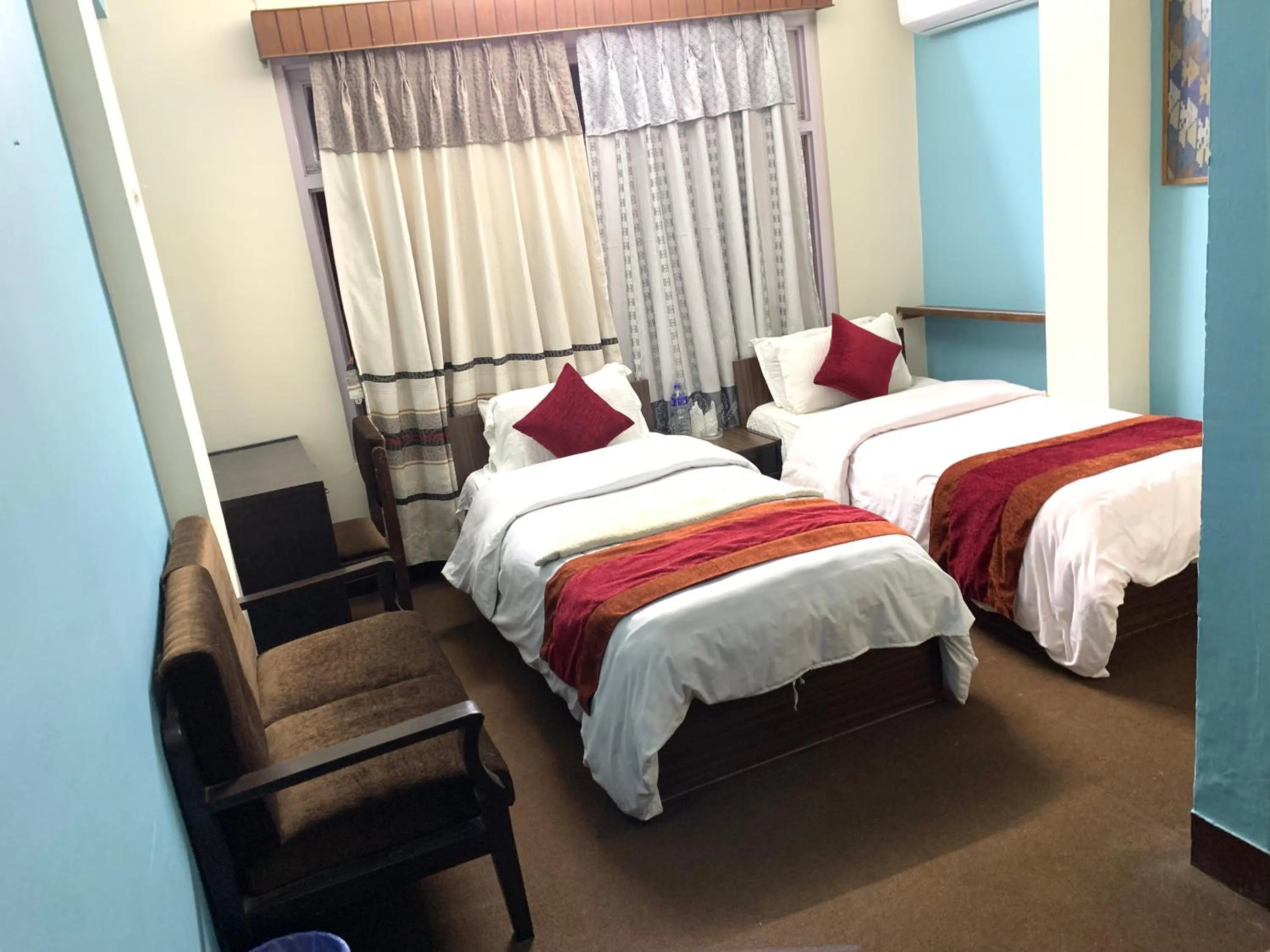 Bed in Hotel Discovery Inn