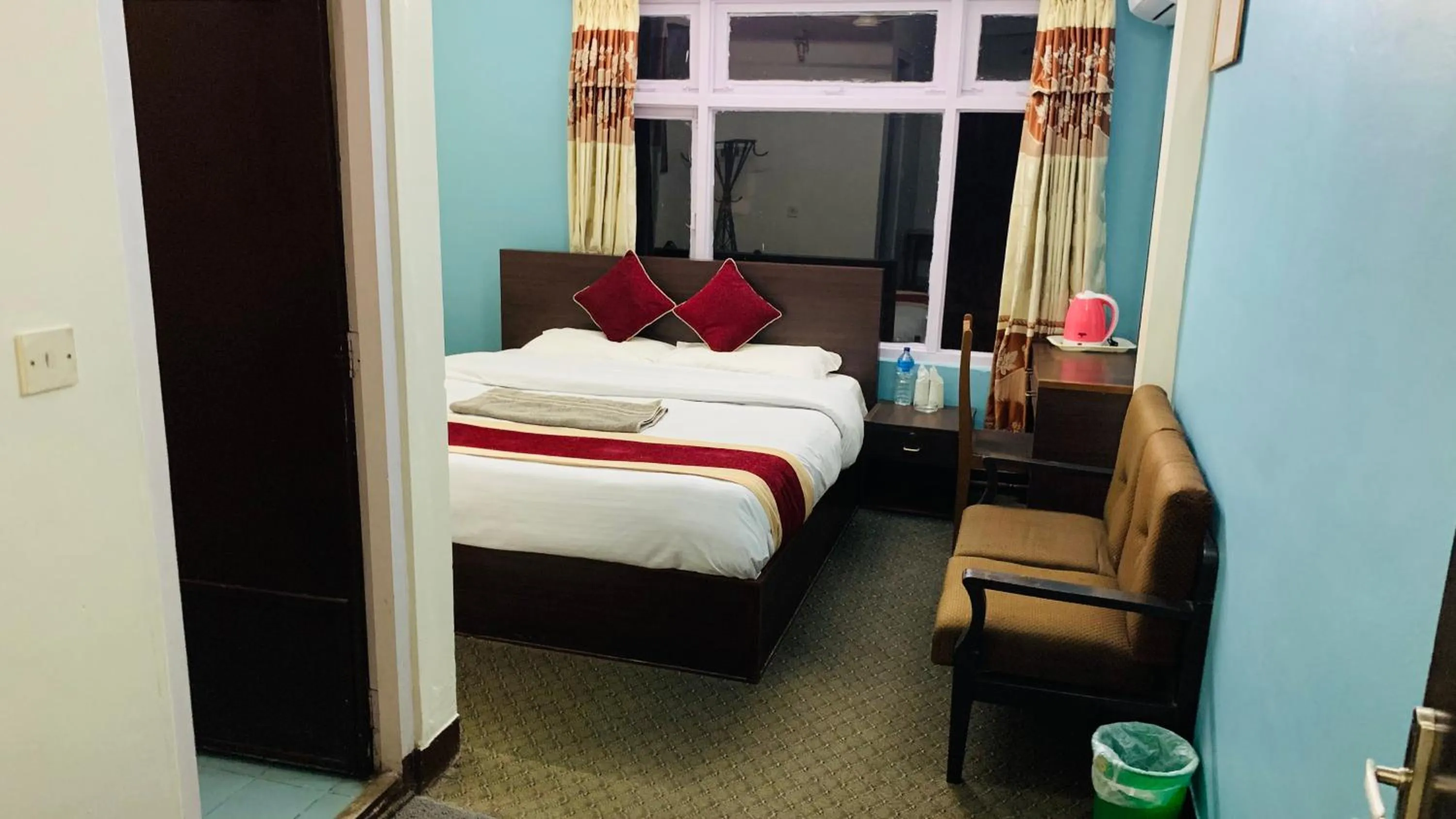 Bed in Hotel Discovery Inn