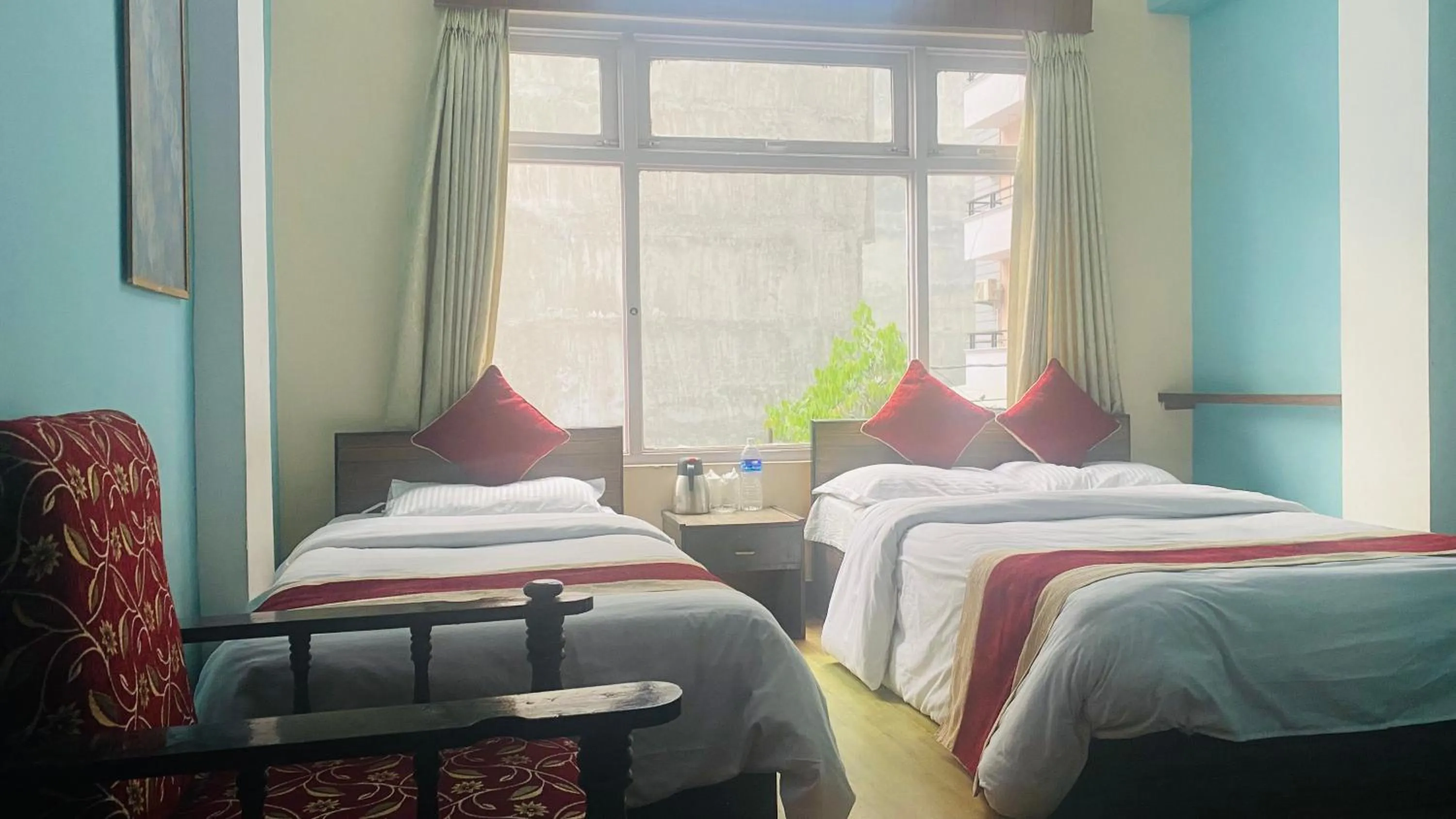 Bed in Hotel Discovery Inn