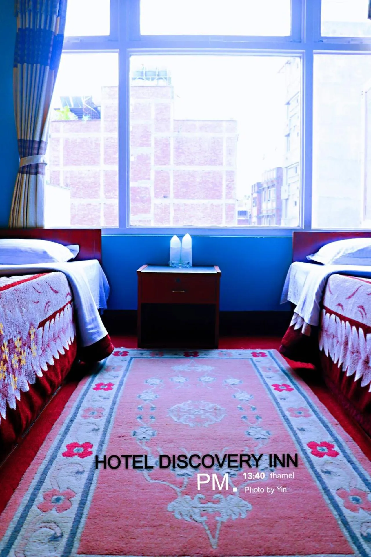 Bed in Hotel Discovery Inn