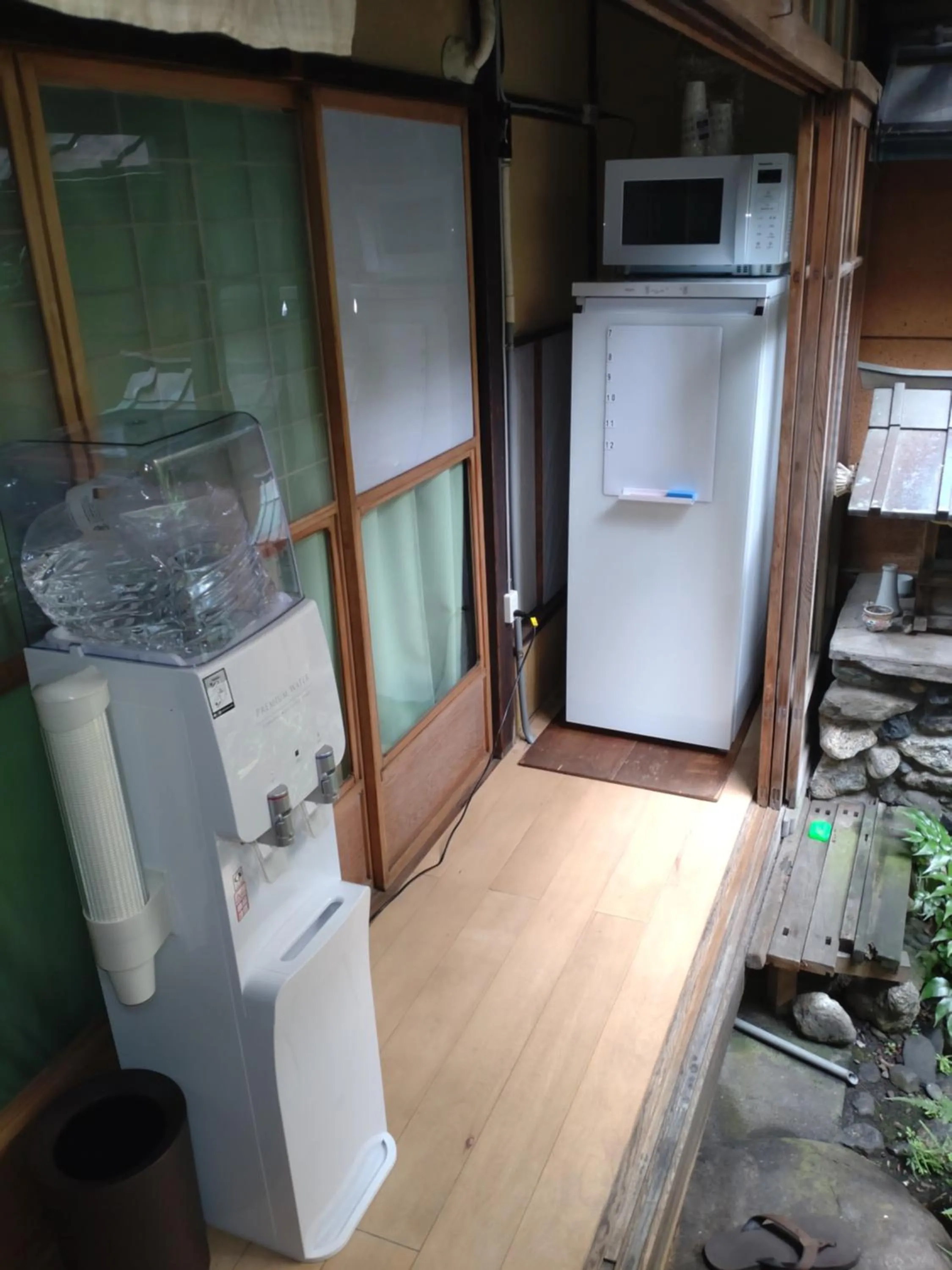 Communal lounge/ TV room in Wajimaya Ryokan