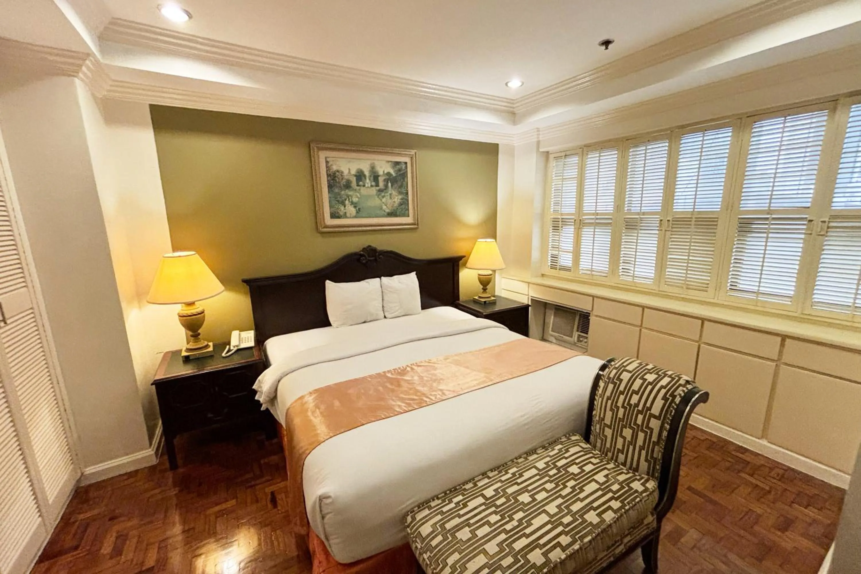 Bed in Lourdes Family Suites Makati powered by Cocotel