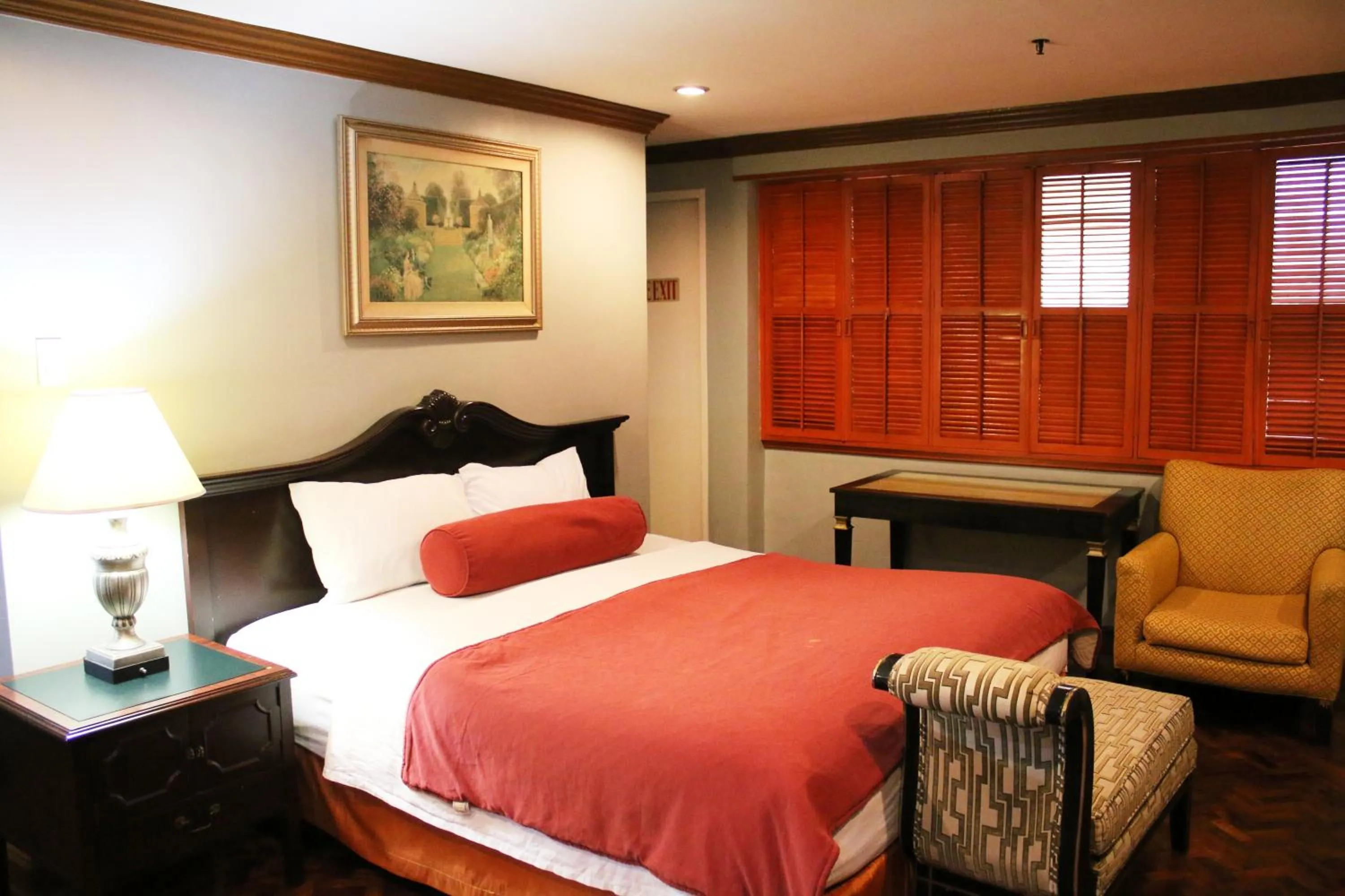 Bed in Lourdes Family Suites Makati powered by Cocotel