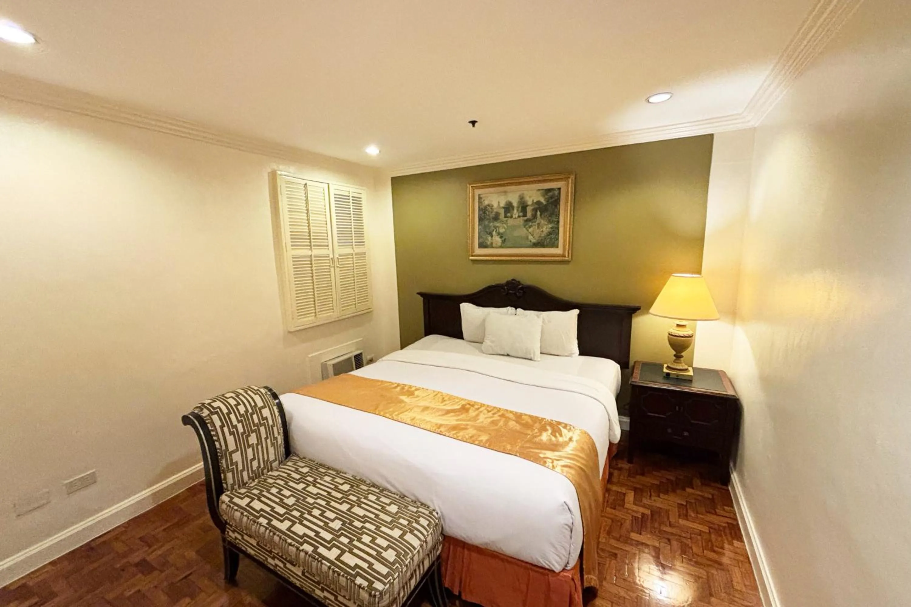 Bed in Lourdes Family Suites Makati powered by Cocotel
