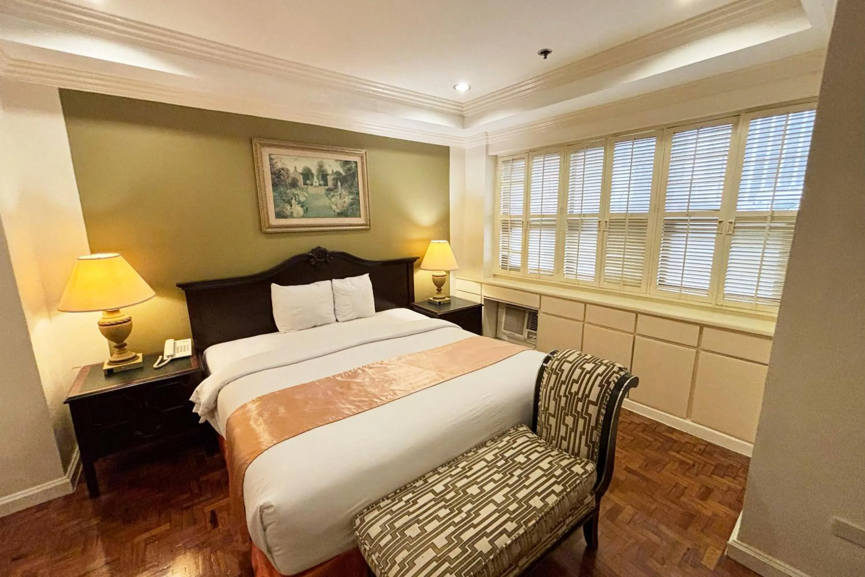 Bed in Lourdes Family Suites Makati powered by Cocotel
