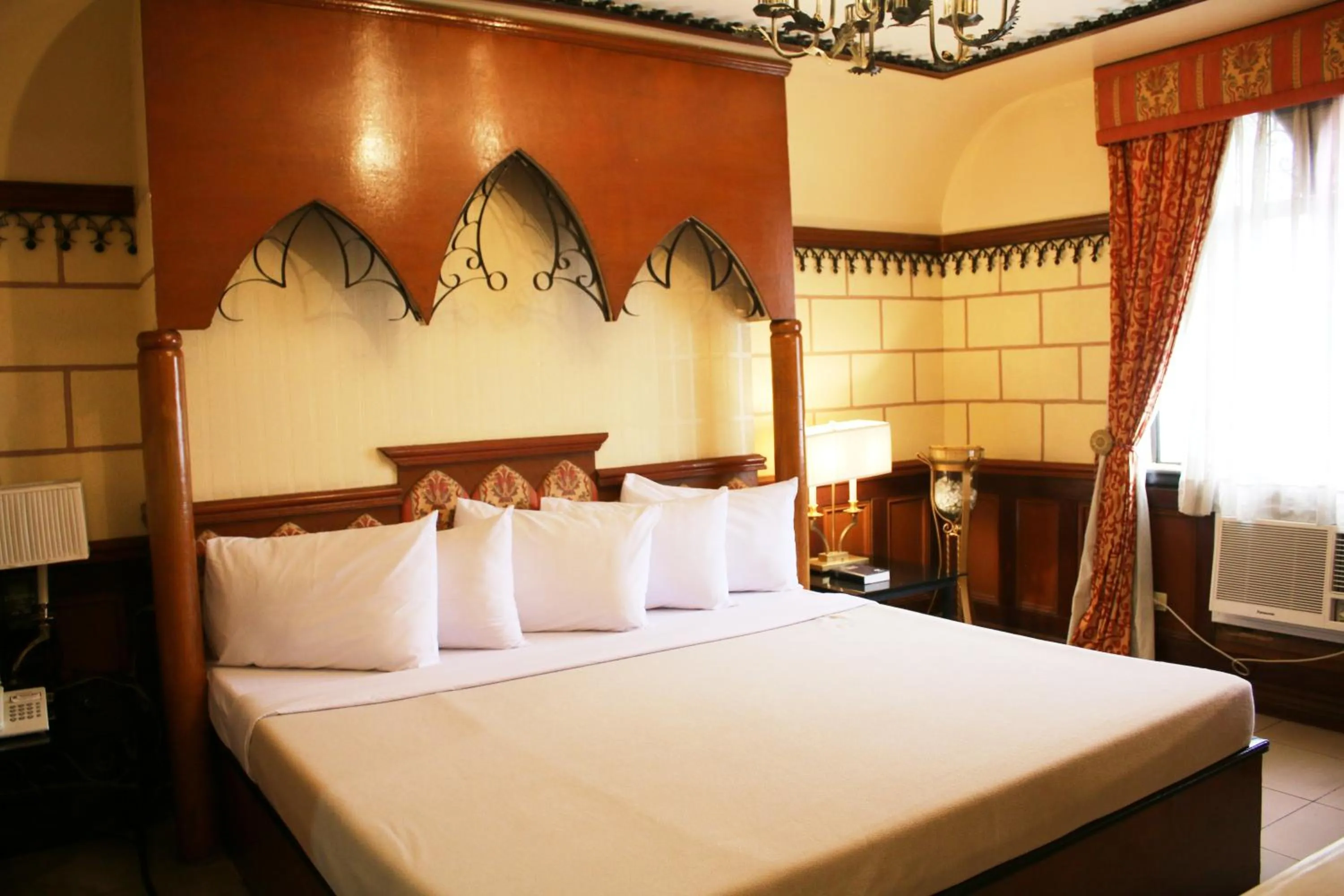 Bed in Camelot Hotel Quezon City powered by Cocotel