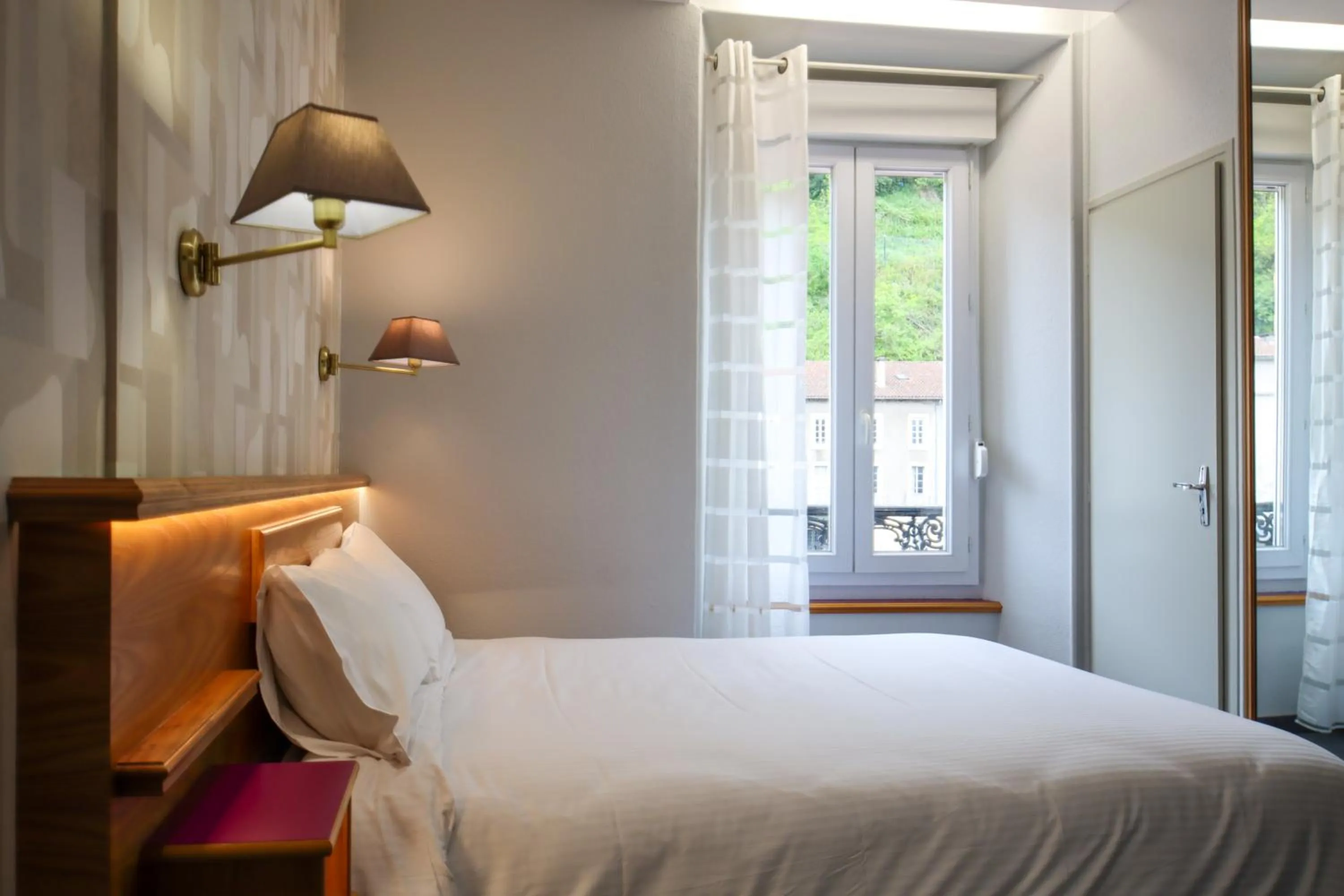 Photo of the whole room, Bed in Hôtel Le Lons