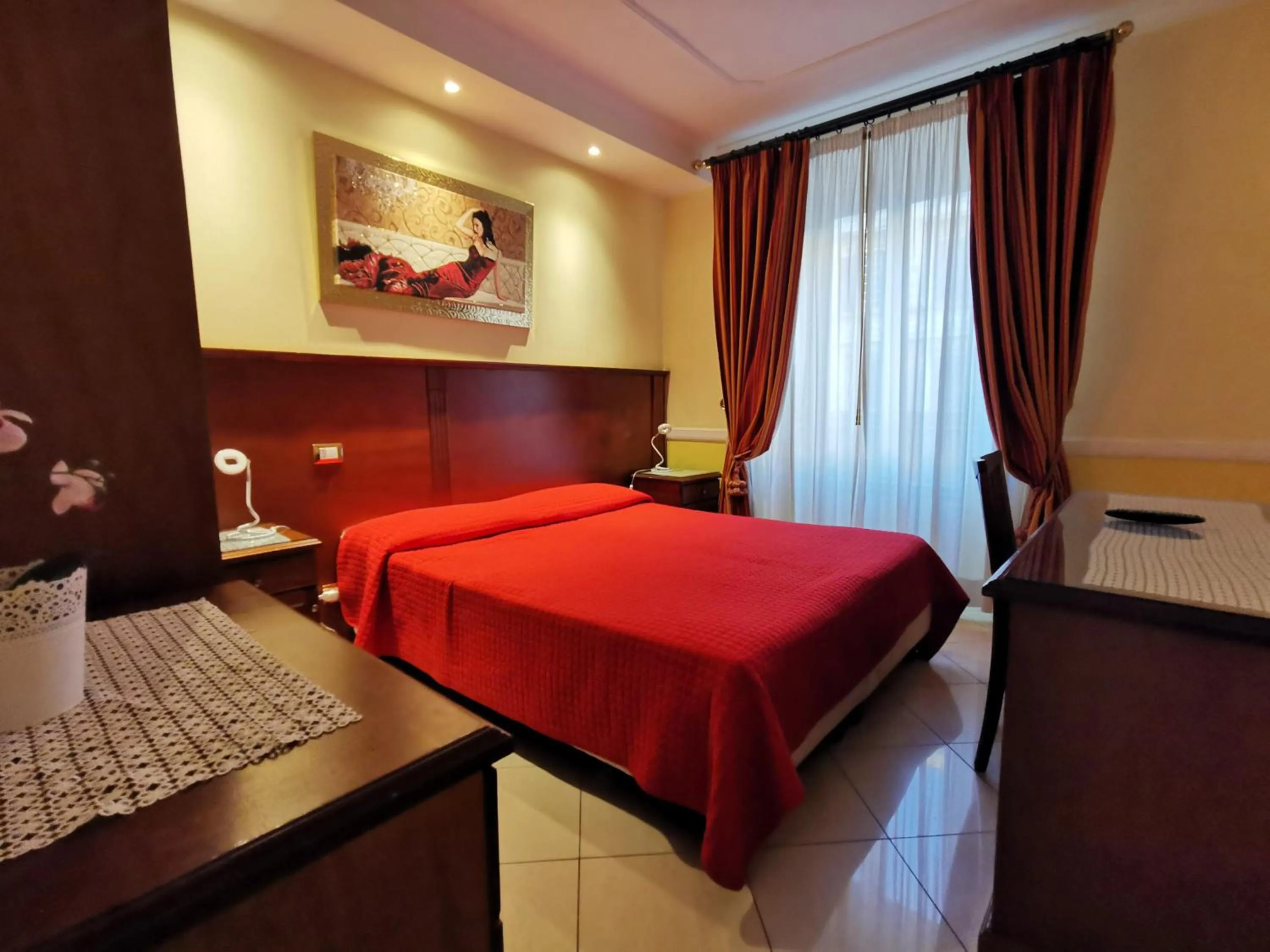 Bed in Hotel Valentino Palace