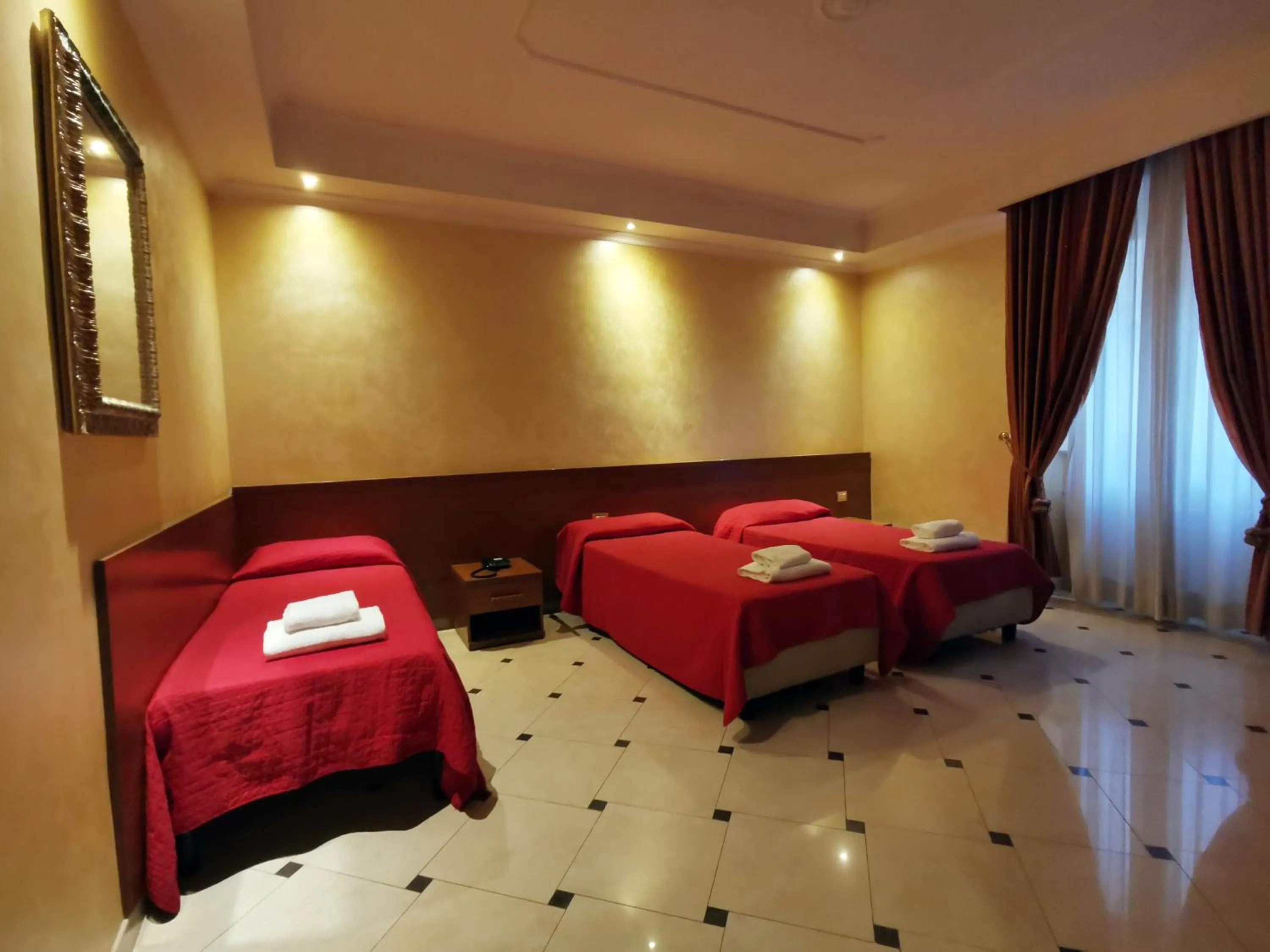 Bed in Hotel Valentino Palace