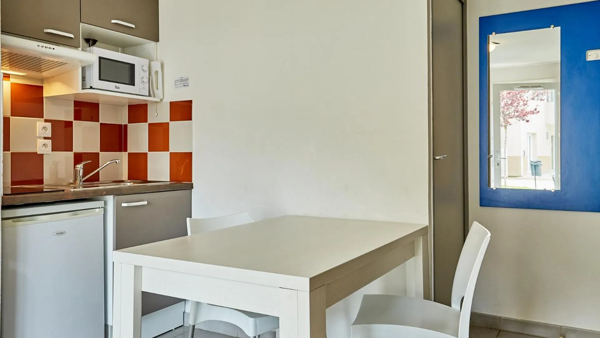 Kitchen or kitchenette in Résidence Vacancéole - Le Domaine de la Corniche