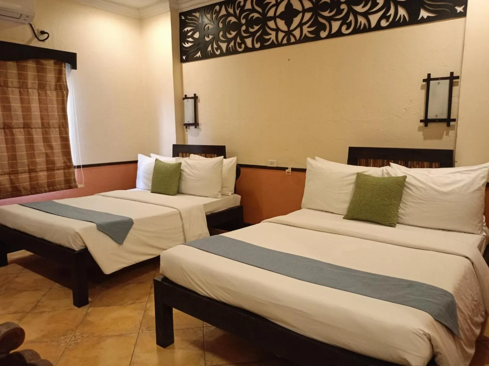 Bed in Playa Tropical Resort Hotel