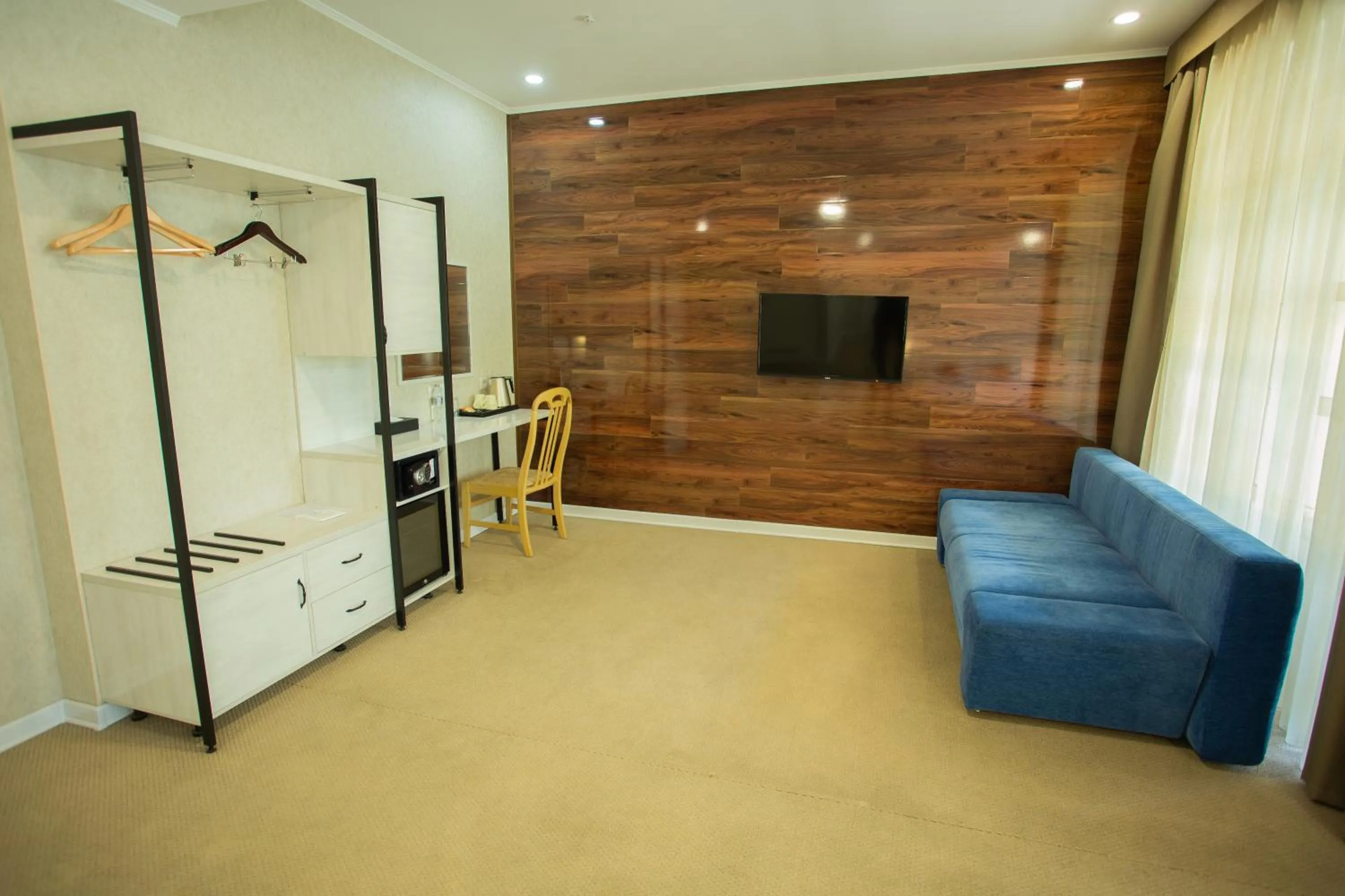 Communal lounge/ TV room in B Hotel Bishkek