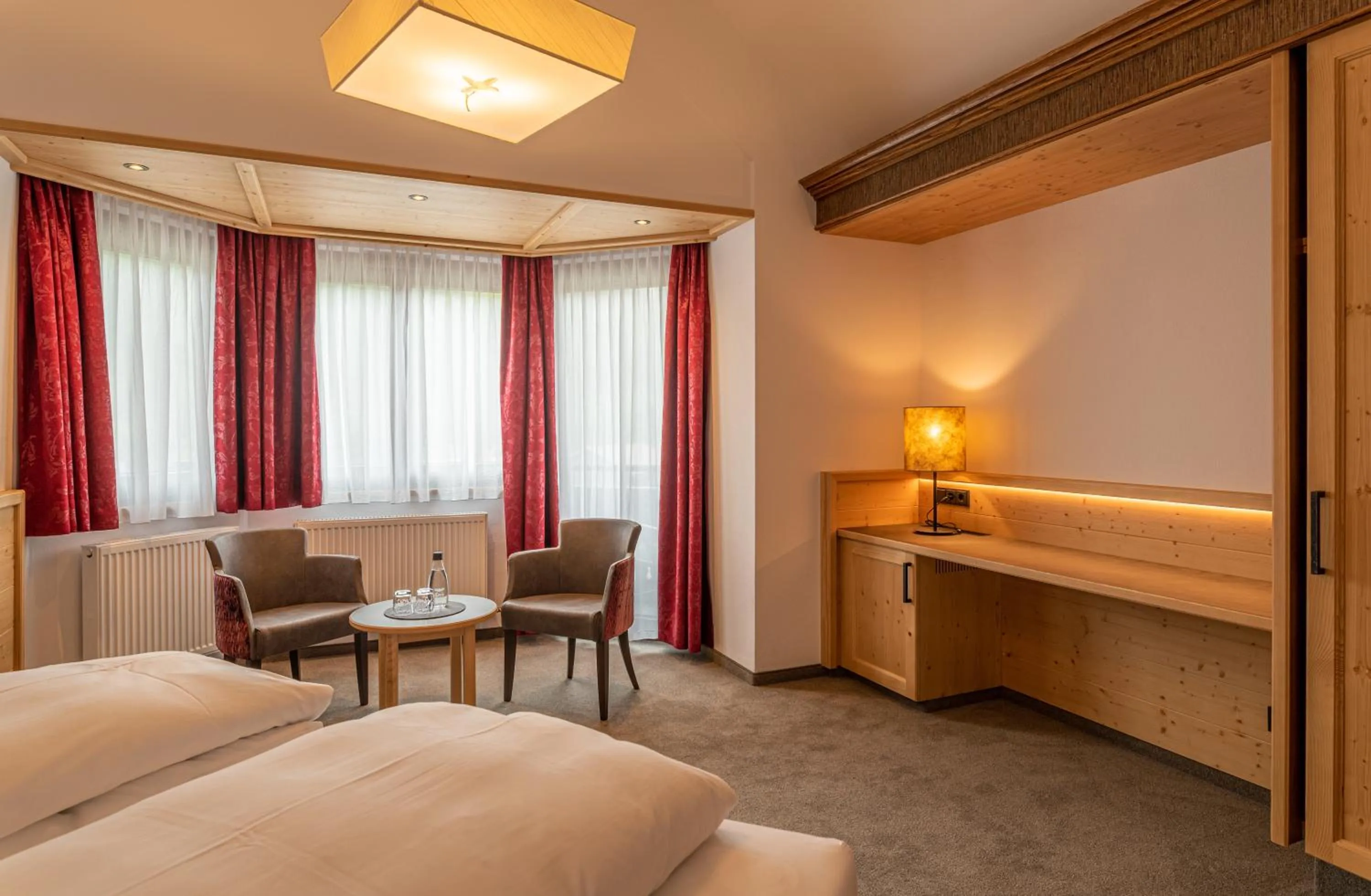 Photo of the whole room, Bed in Hotel Tyrol am Haldensee