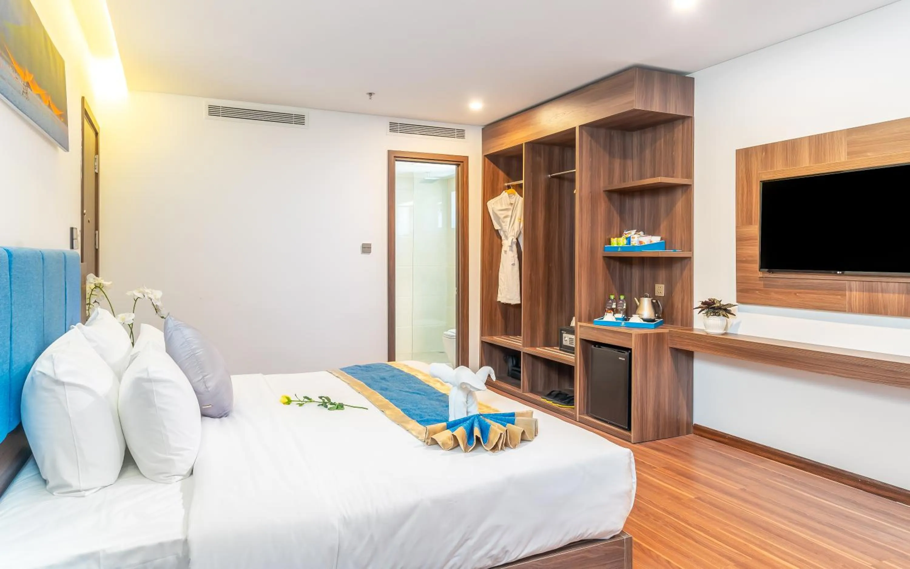 Bed in Grand Gold Hotel