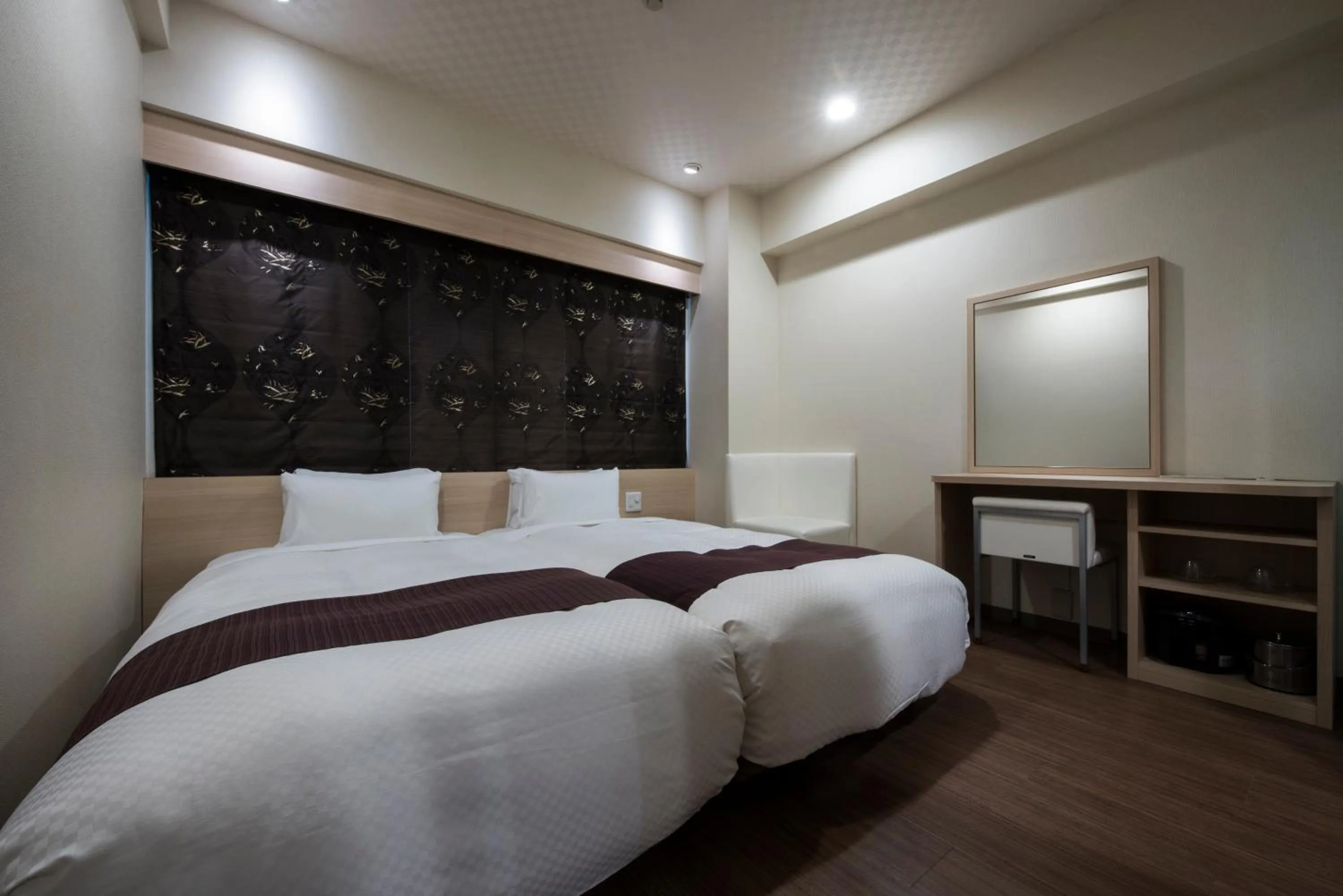 Photo of the whole room, Bed in Nagasaki Bus Terminal Hotel