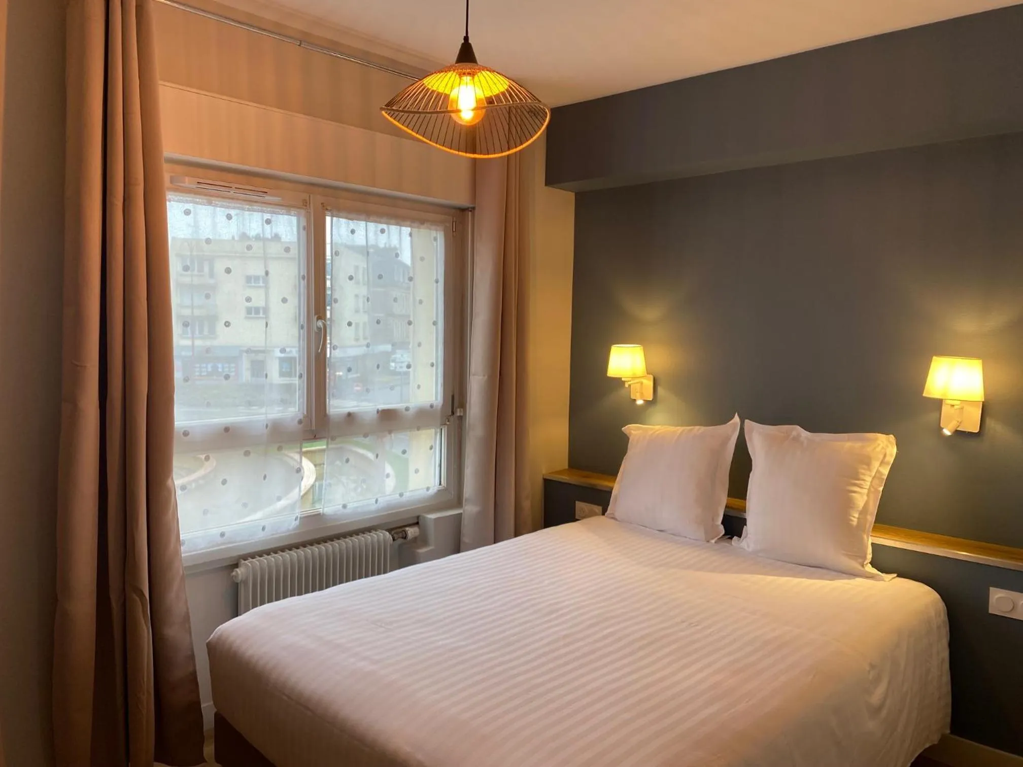 Bed in Hotel de Bretagne