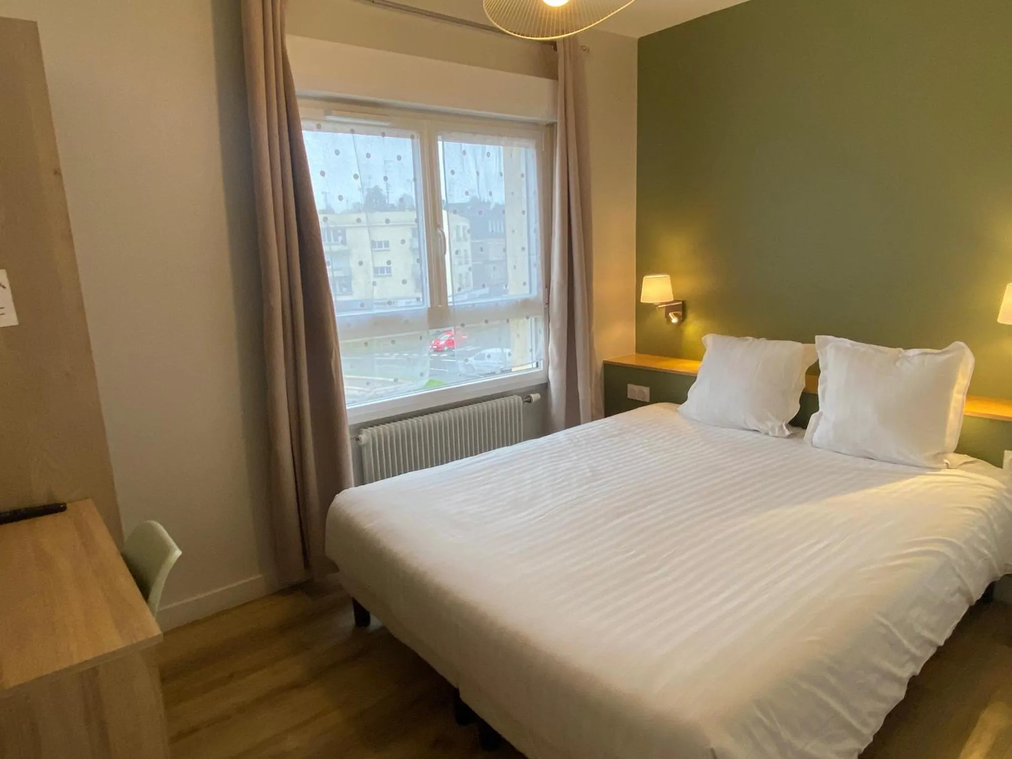 Bed in Hotel de Bretagne