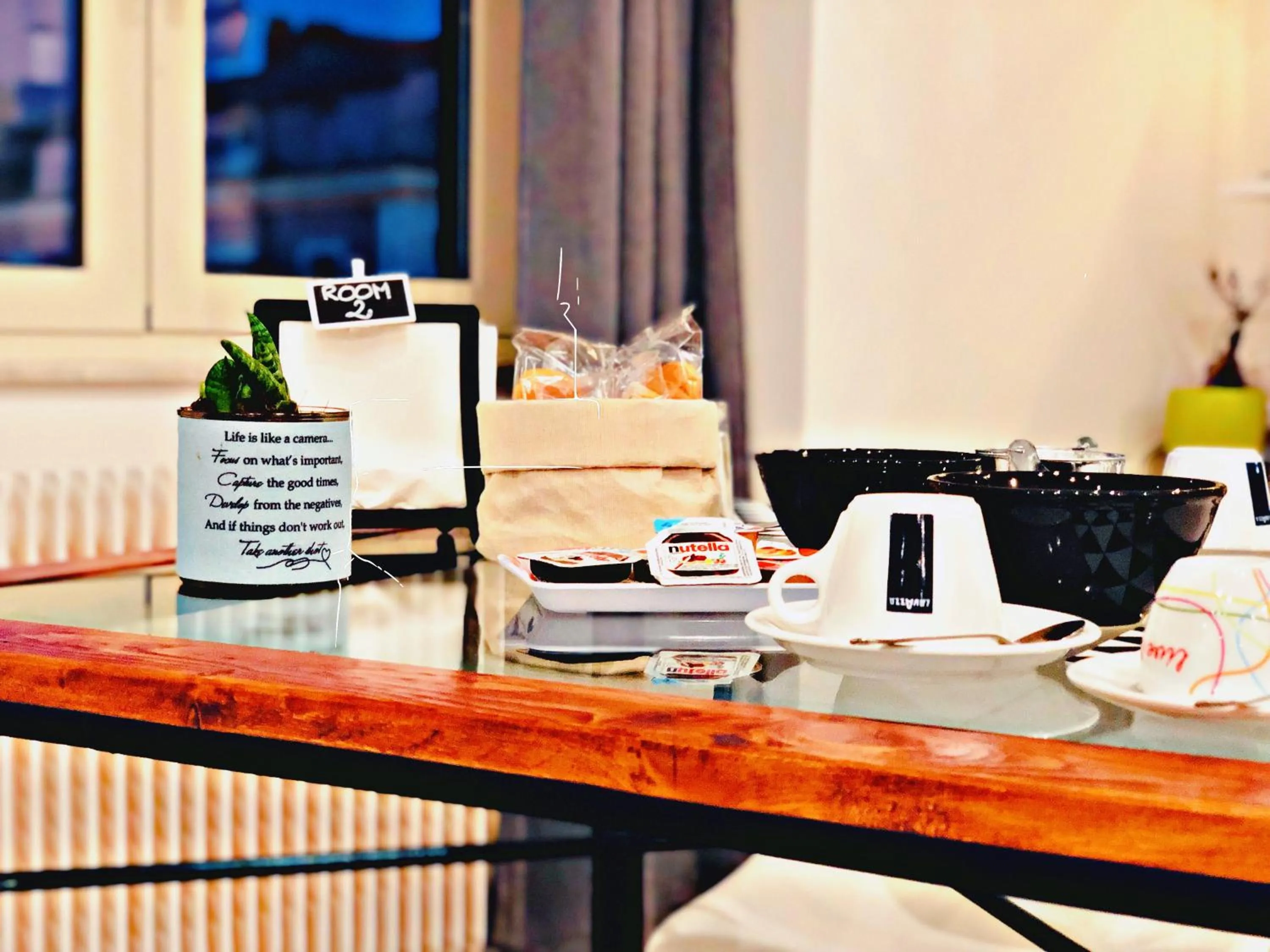 Communal lounge/ TV room in Il BorGhetto Guest House