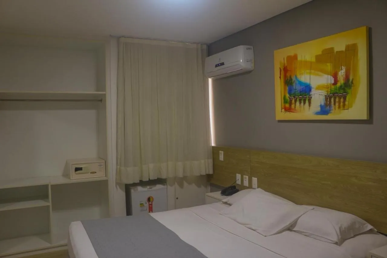 Bed in Hotel Três Caravelas