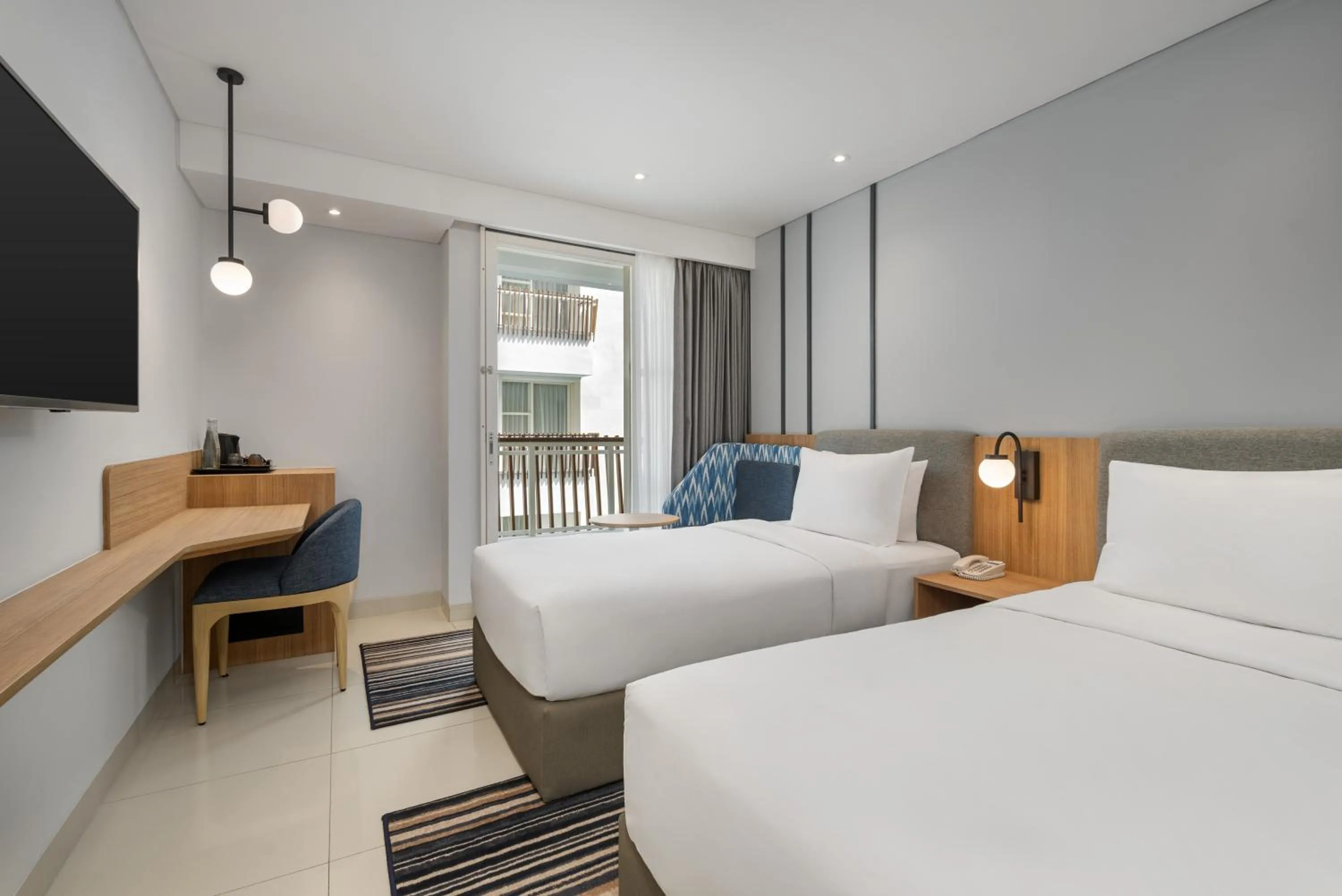 Bed in Holiday Inn Express Bali Sunset Road by IHG