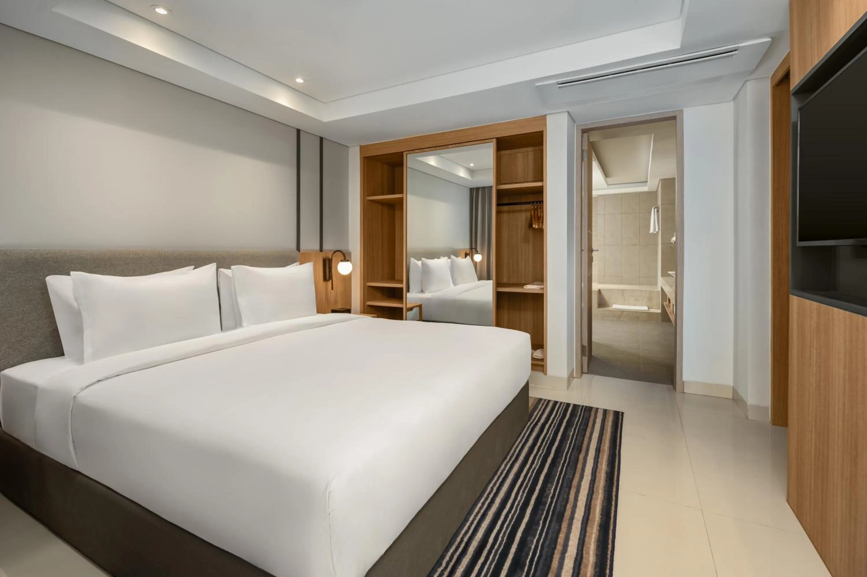 Bed in Holiday Inn Express Bali Sunset Road by IHG