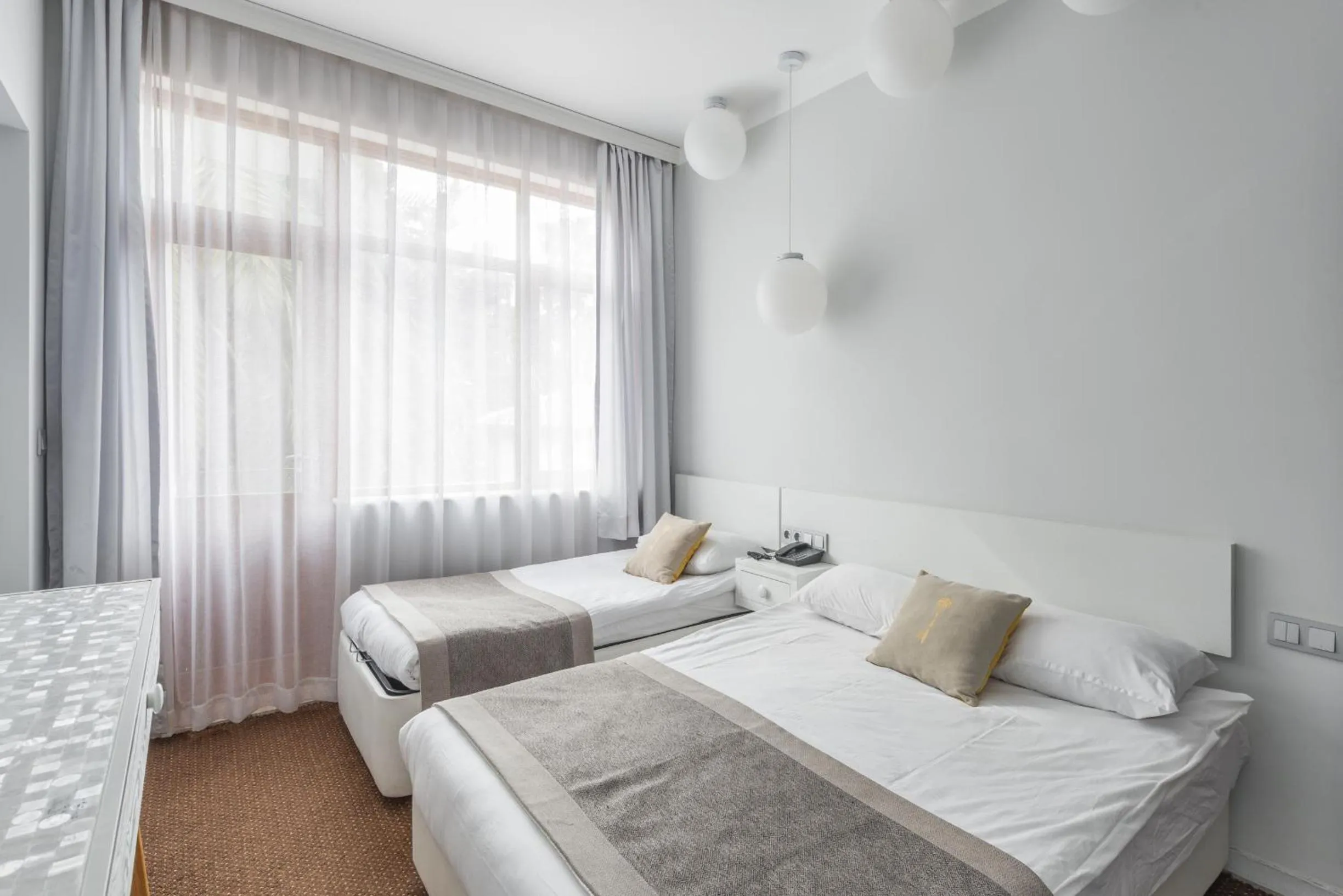 Seating area, Bed in Delight Deluxe Hotel & Spa