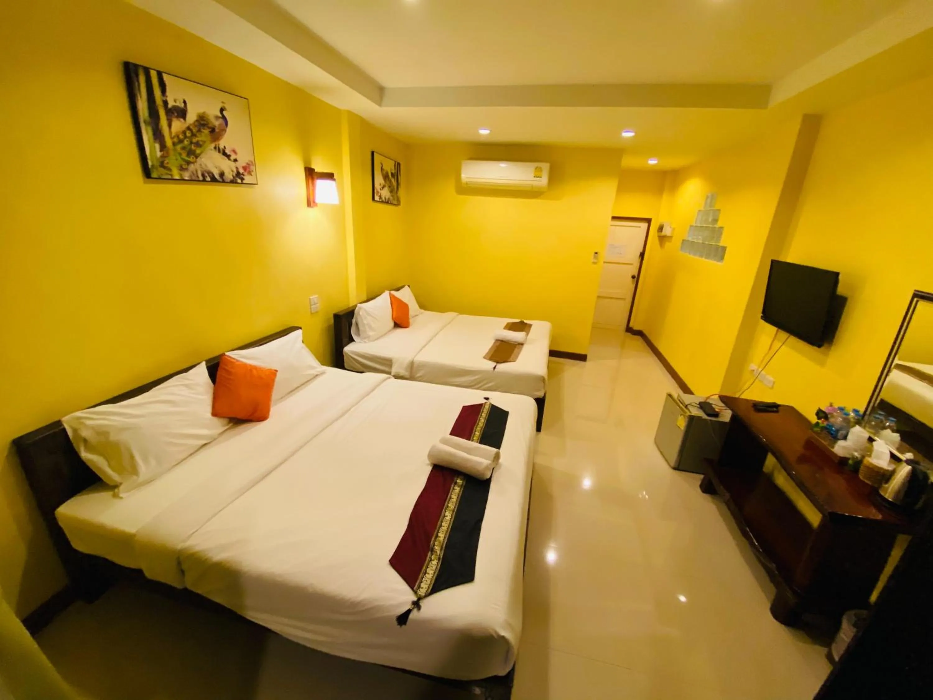 Bed in Pranmanee Beach Resort