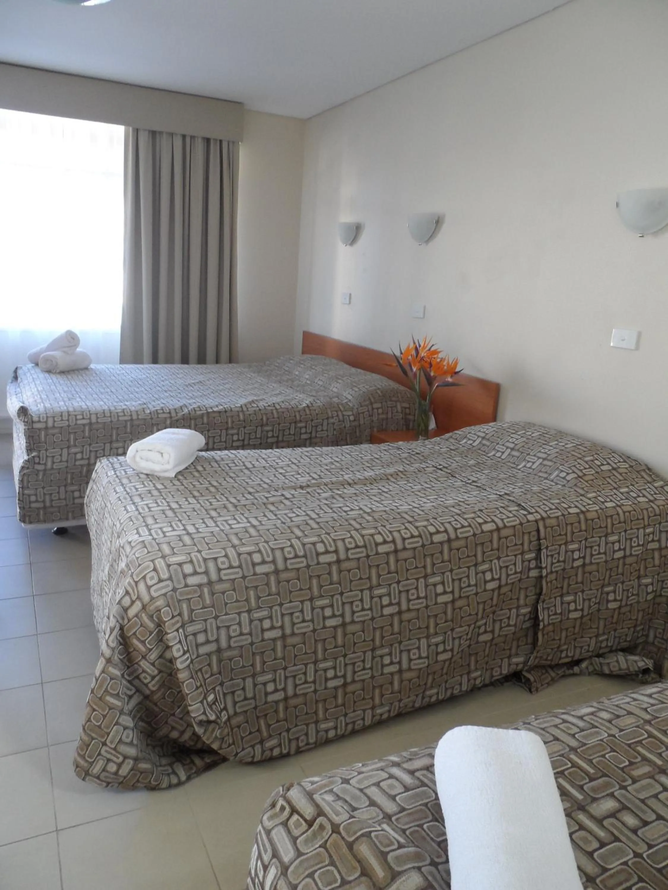 Bed in Liberty Plains Motor Inn