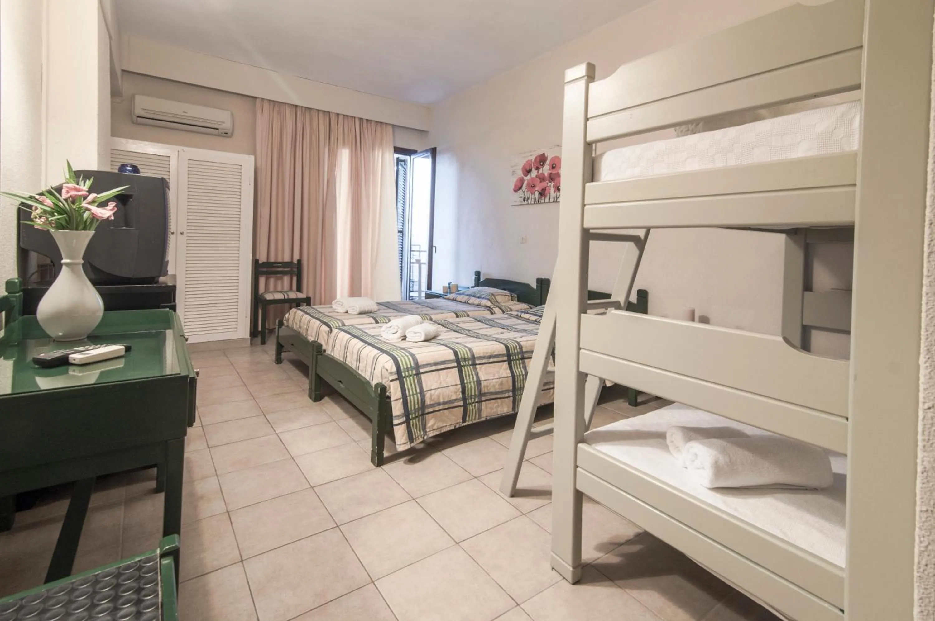 Photo of the whole room, Bed in Mitsis Belvedere