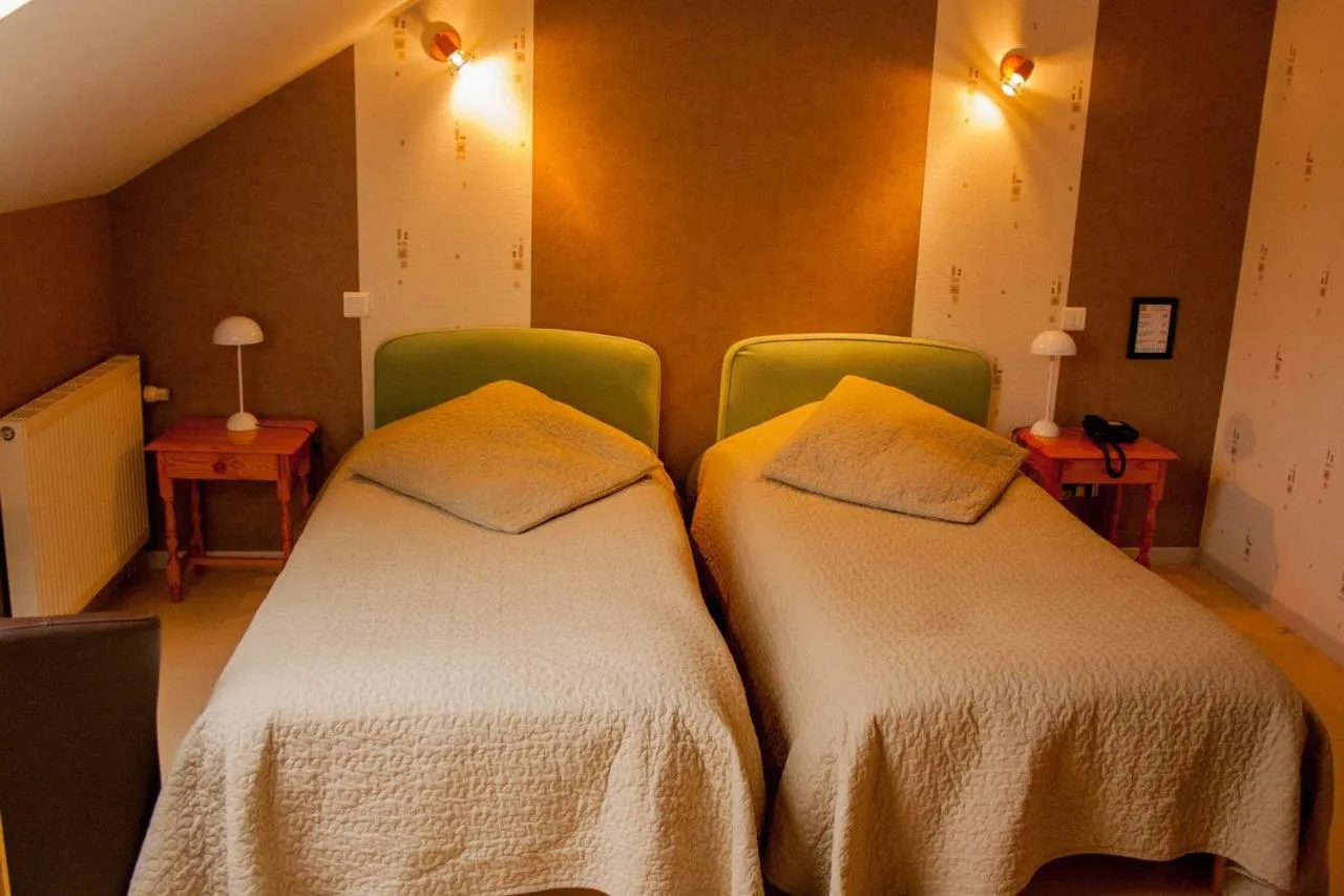 Bed in Auberge de la Fontaine