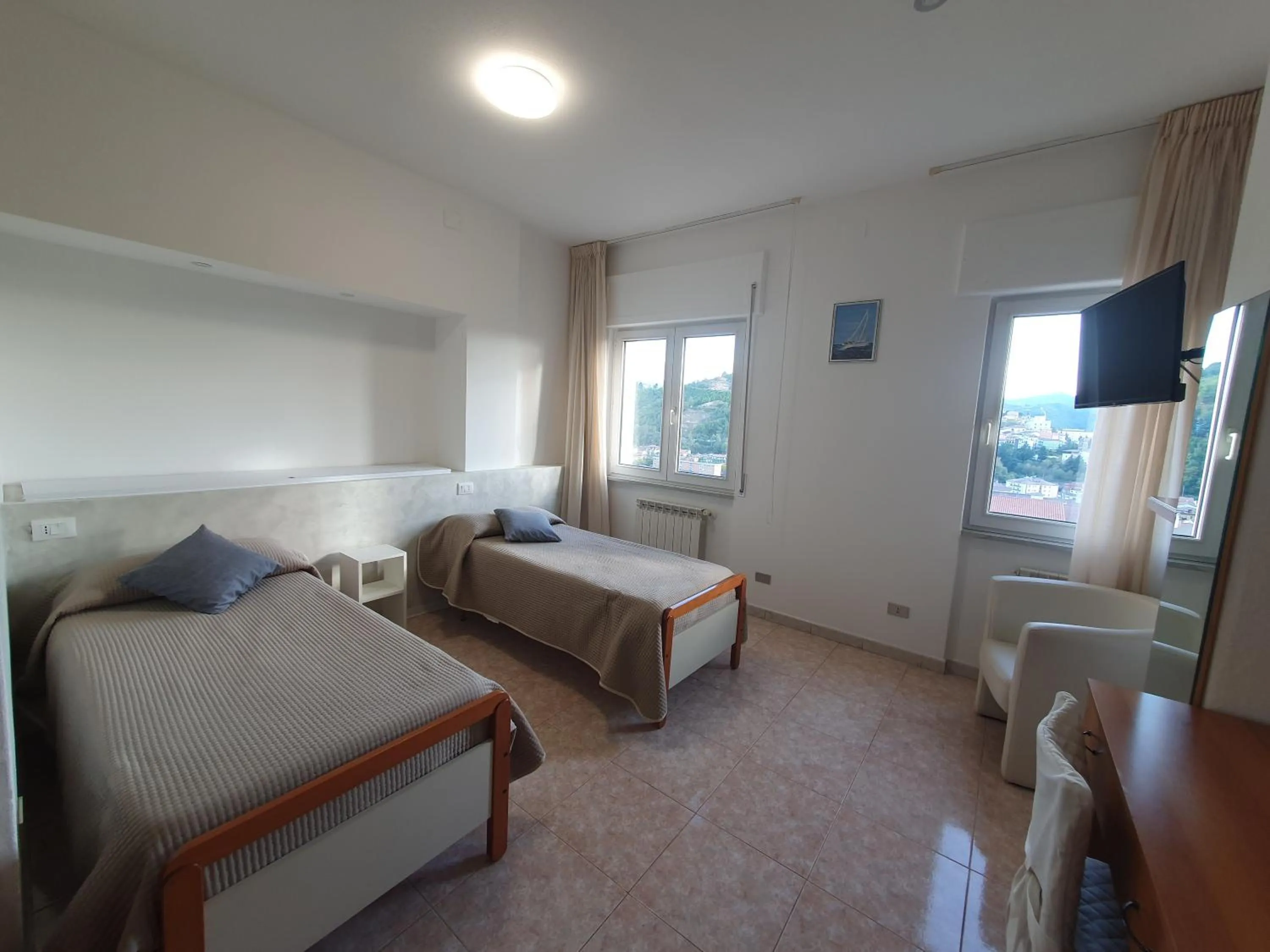 Photo of the whole room, Bed in Hotel Ristorante SUPERSONIK