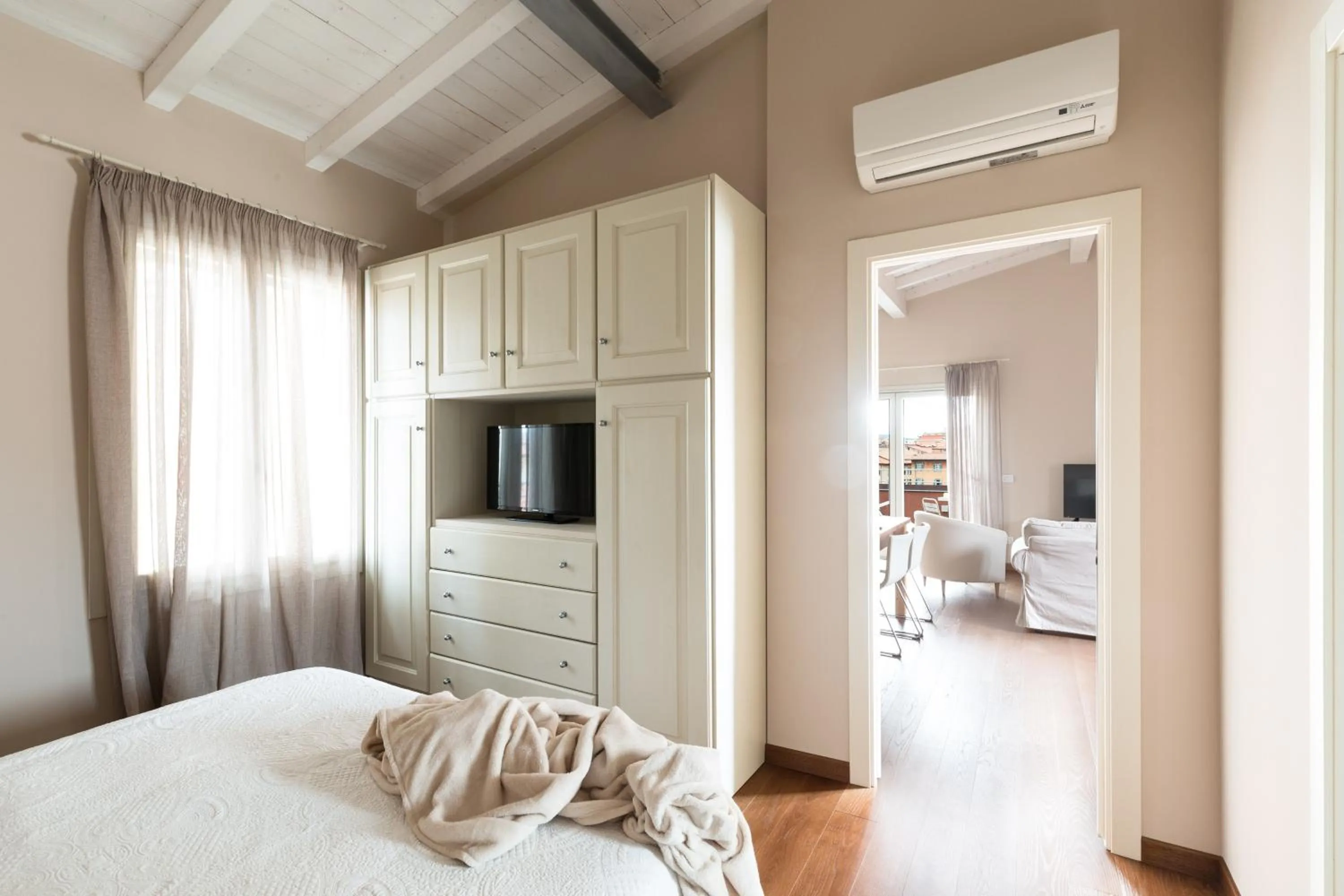 Communal lounge/ TV room, Bed in Agave in Città