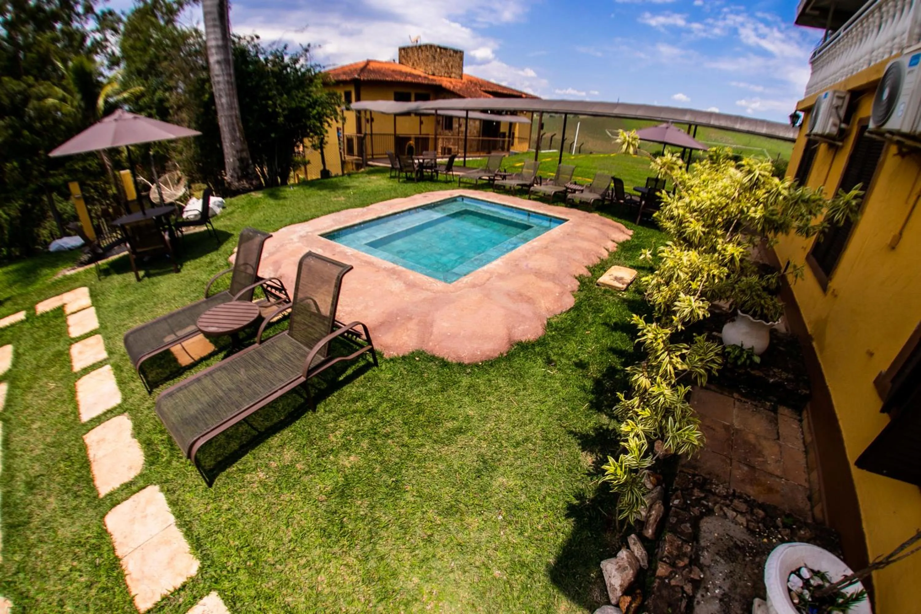 Swimming pool in Hotel Fazenda Horizonte Belo
