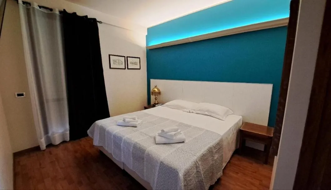 Bed in Hotel Elefante