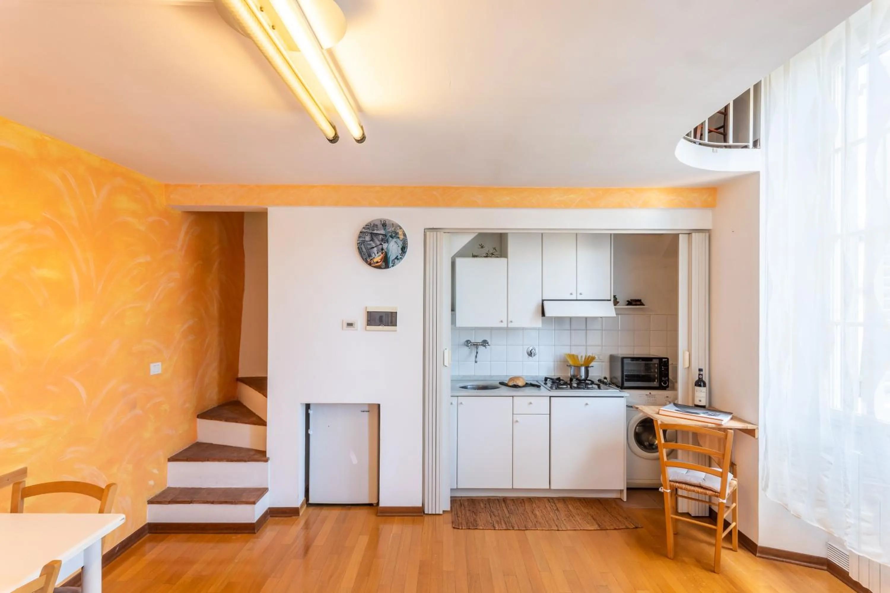 Kitchen or kitchenette in Cavourotto Terrace by Mmega